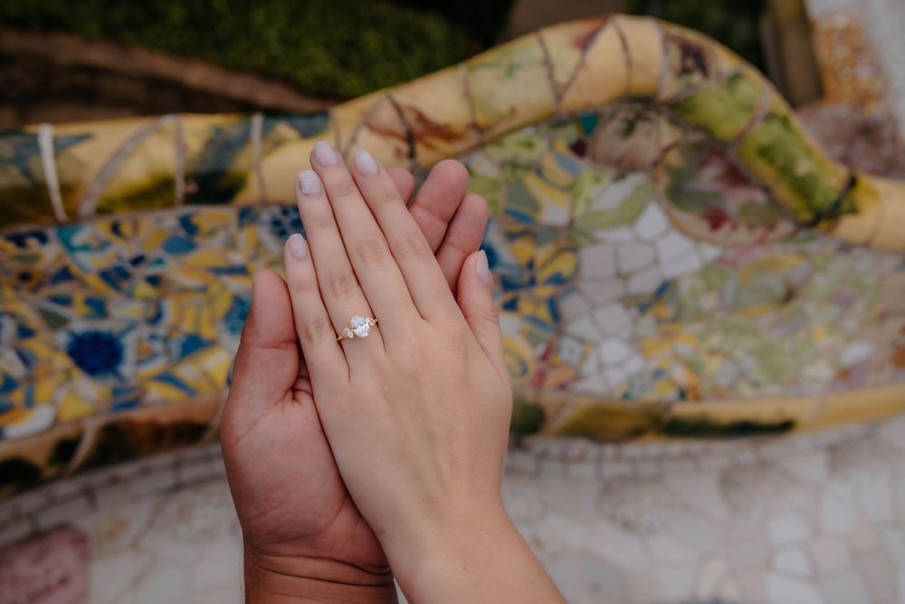Candid Barcelona photographer capturing joyful engagement photos.
