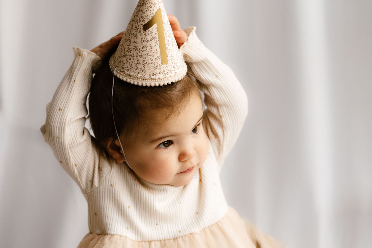 Close-up portrait with soft white background and gentle lighting. Photography in Buckinghamshire.