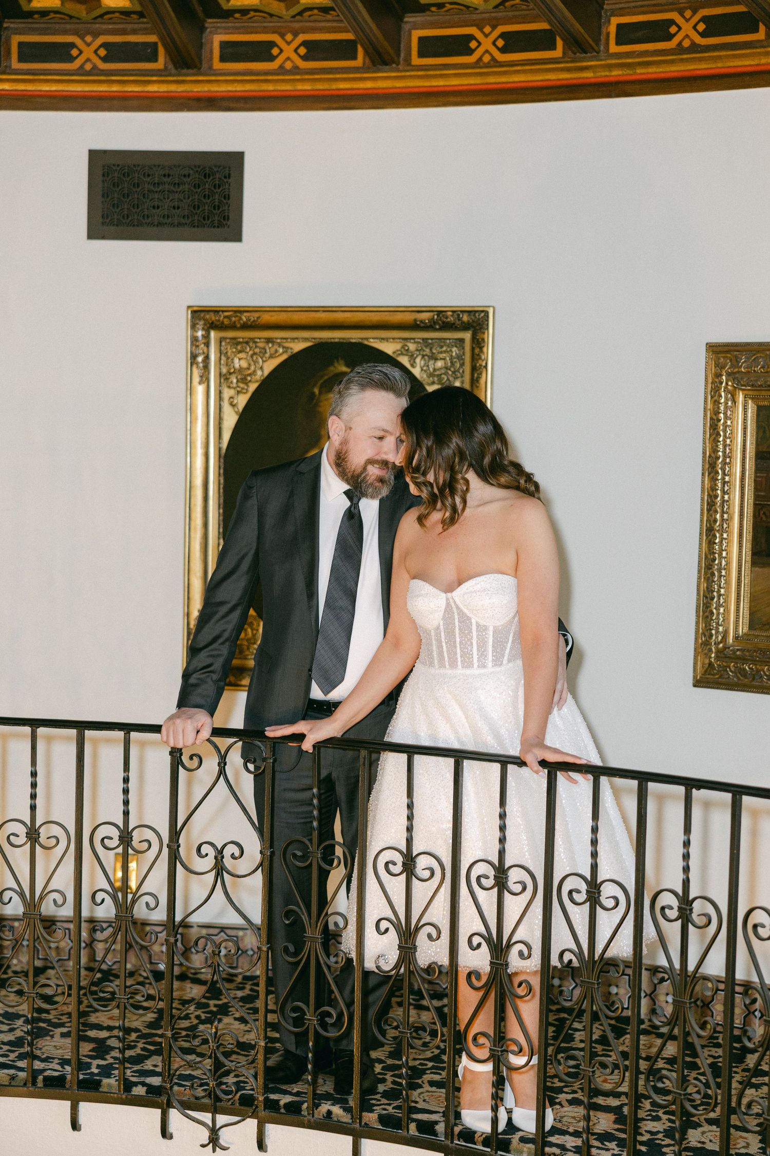 Couple posed on staircase