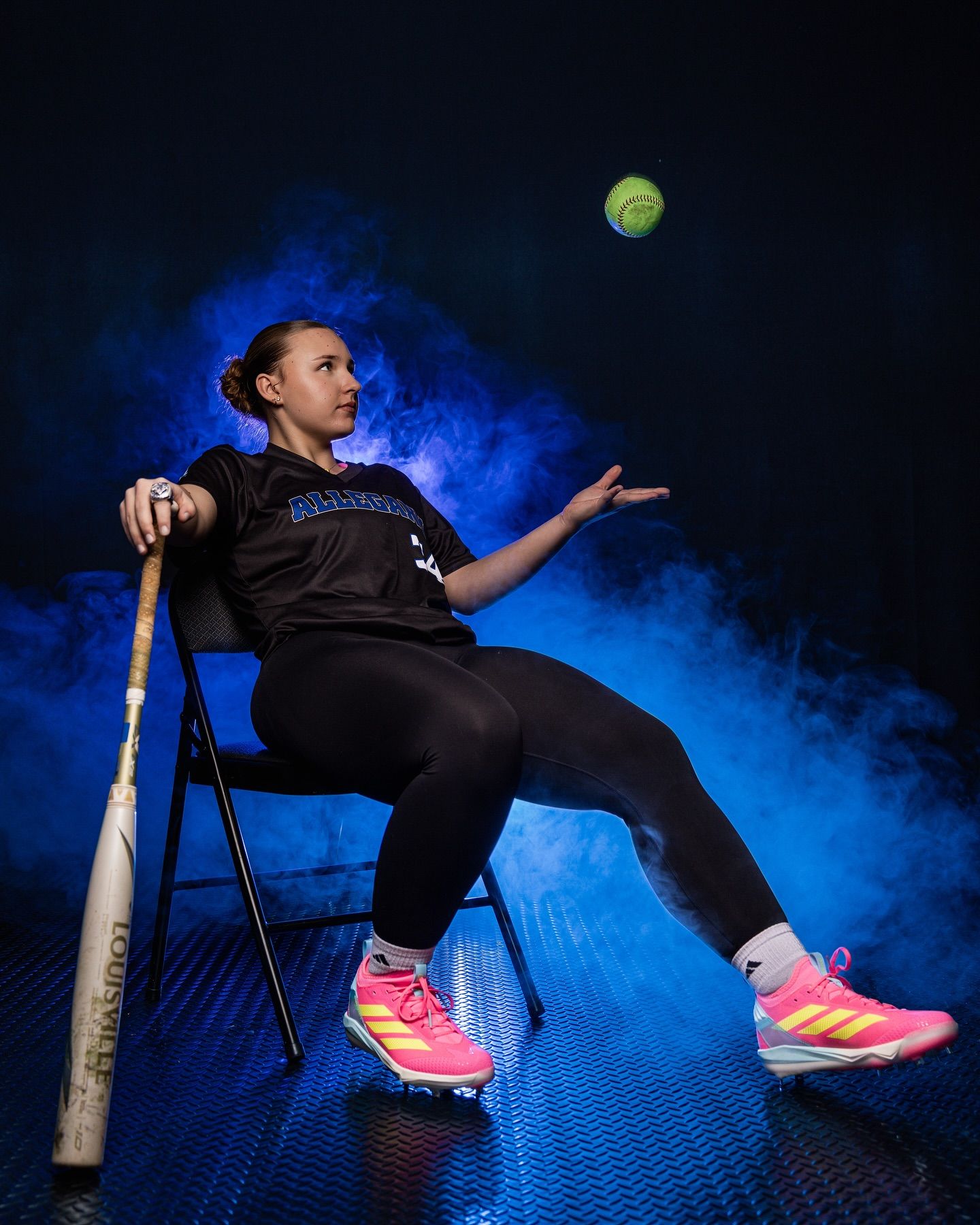 A dramatic sports photo sequence showing a baseball player posing with a bat against a blue smoke background.