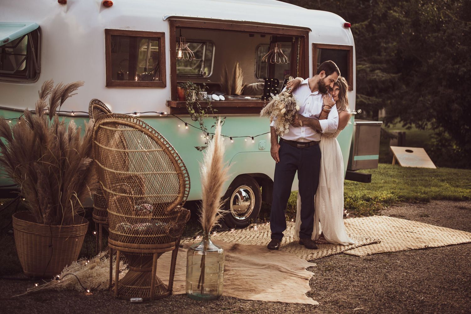 A collage of vintage-style wedding photos showing rustic outdoor ceremony and reception details in sepia tones.