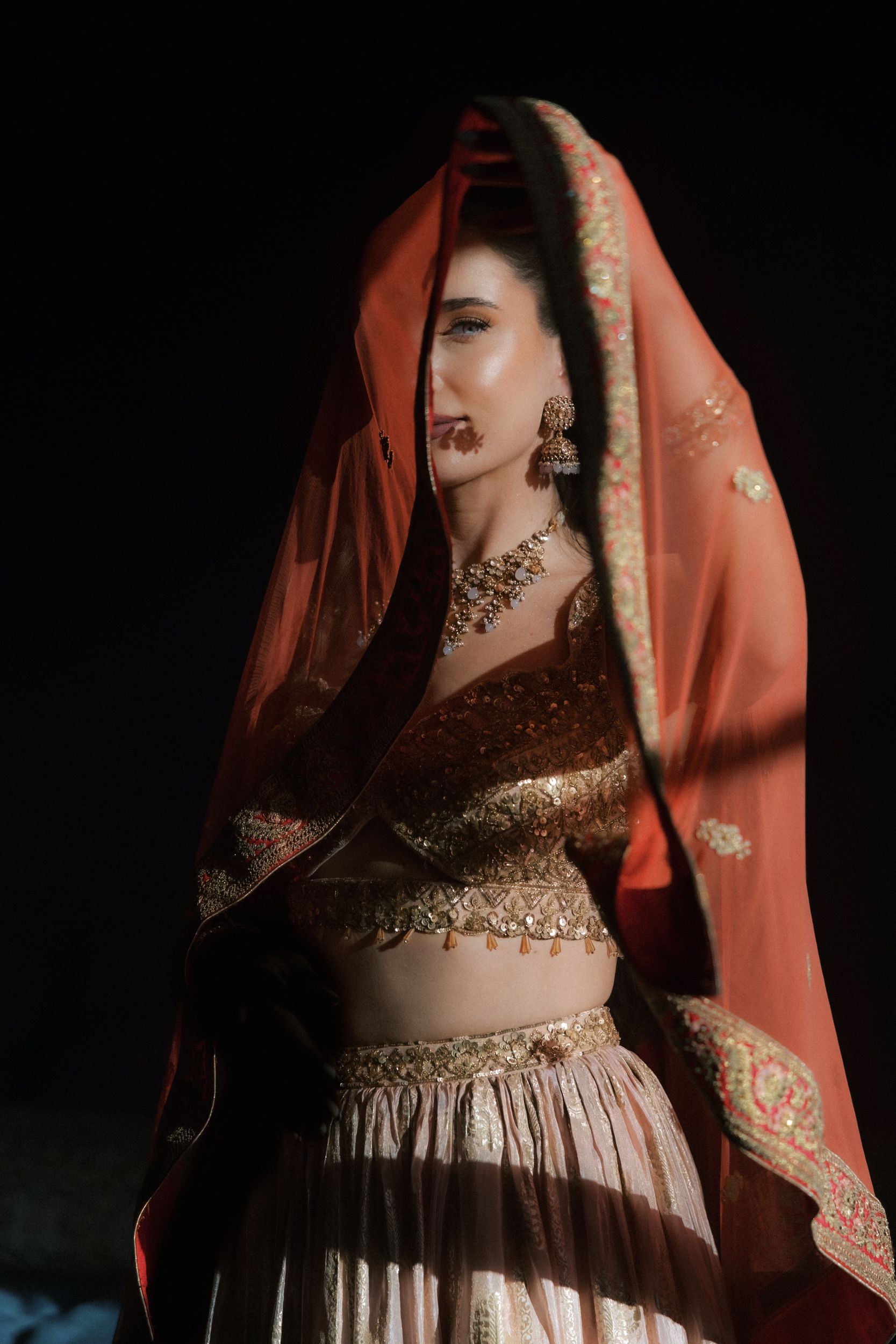 editorial bridal portrait red veil multicultural wedding inspiration