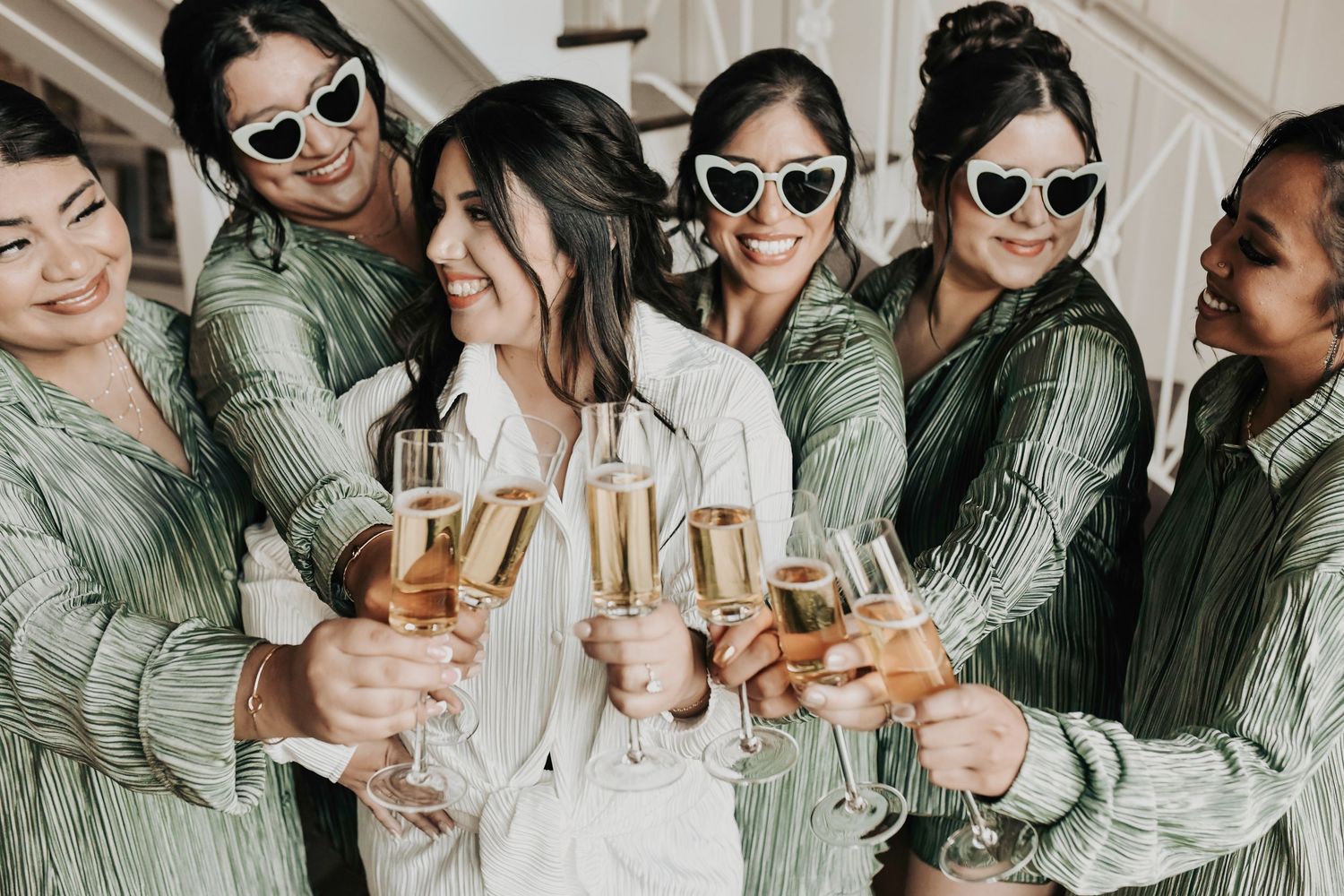 Bridesmaids laughing together during spring wedding portraits