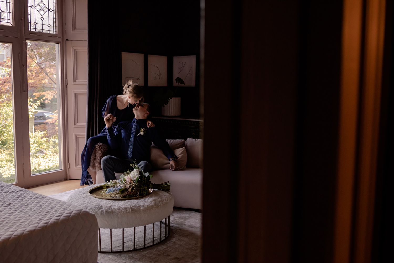 couple relaxing in their suite at the rosemont inn, downtown kingston, ontario.