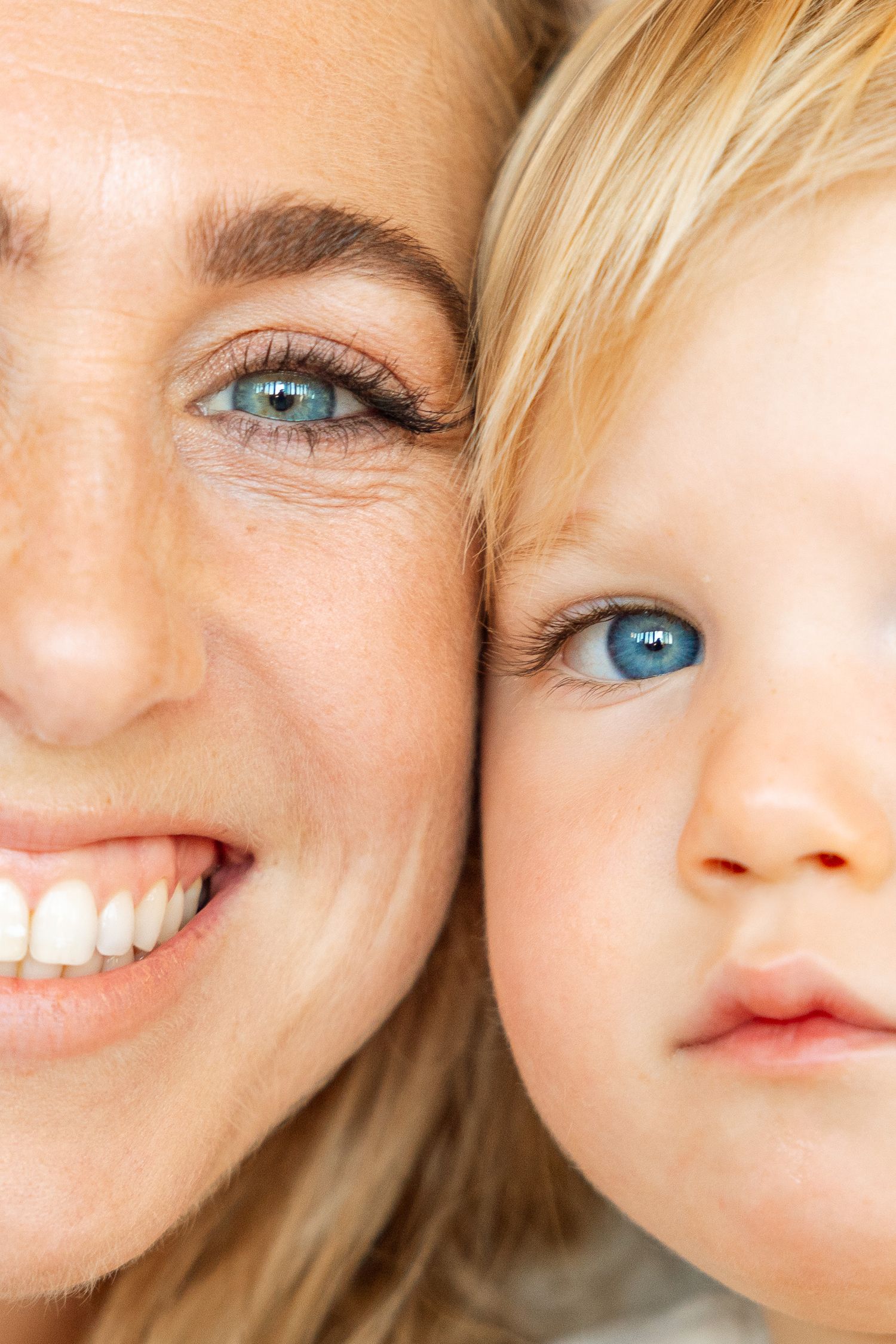A mother and her son with matching deep blue eyes.