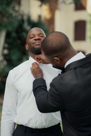 Morning Session, groom getting ready