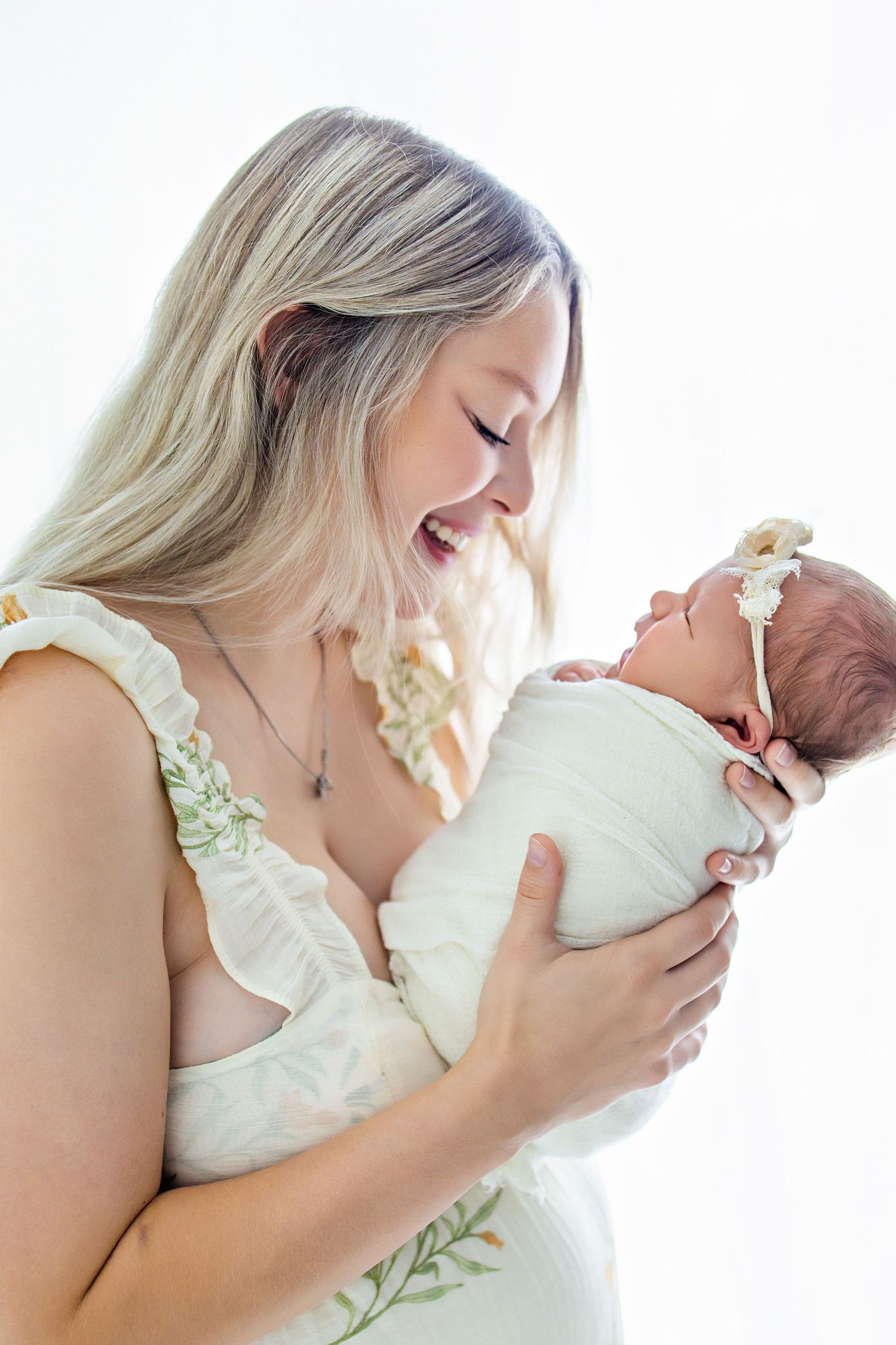 A tender series of close-up portraits showing gentle cuddles and affectionate moments on a white background.