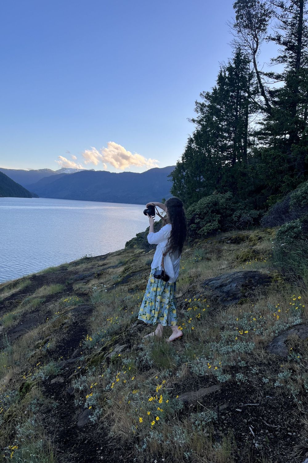 Katie Phillips (Soulfull Photographs) the photographer on Comox Valley Lake Bluffs taking photos with her camera