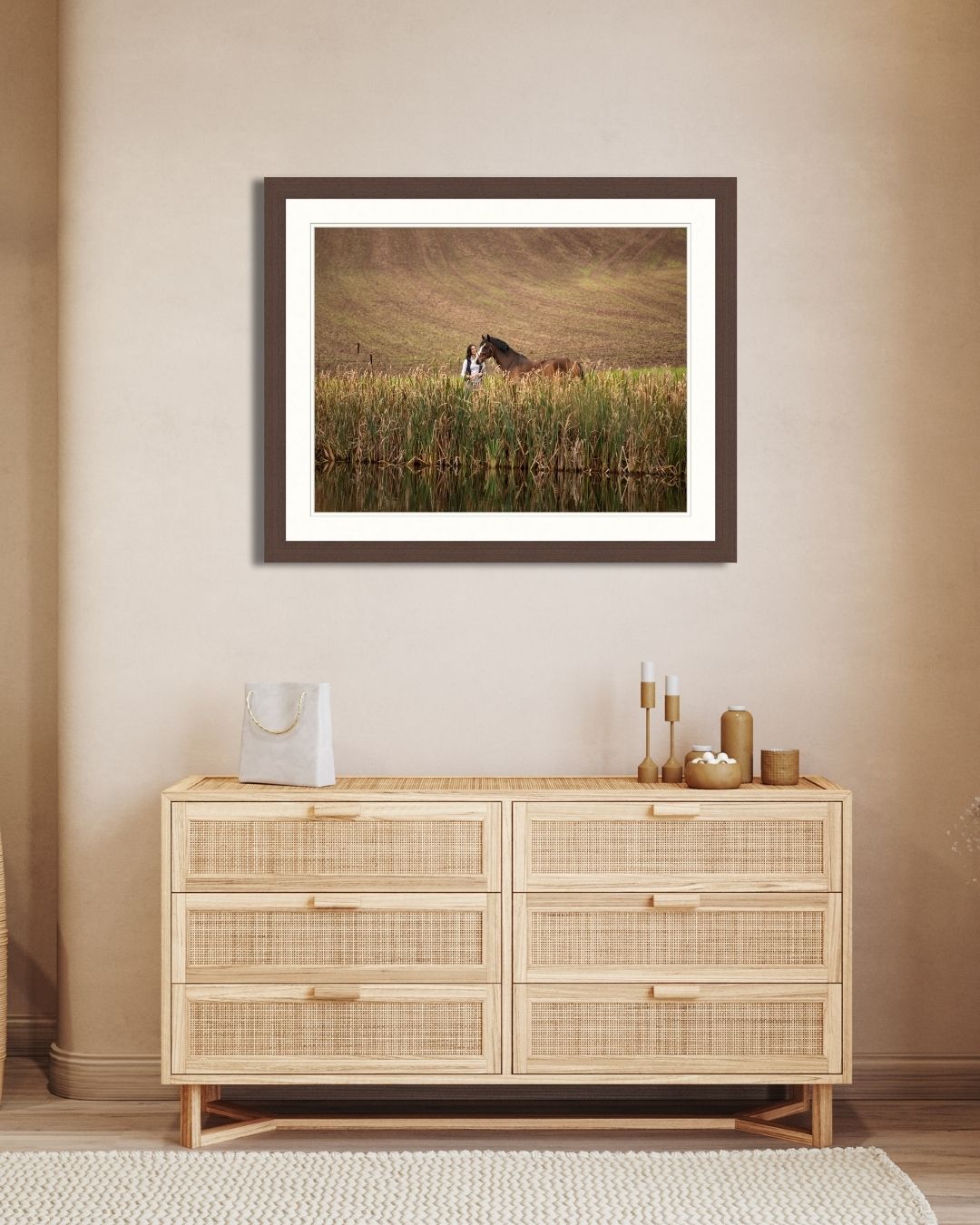 Natural rattan cane webbing credenza with sculptural legs and minimalist design displayed in modern interior space.