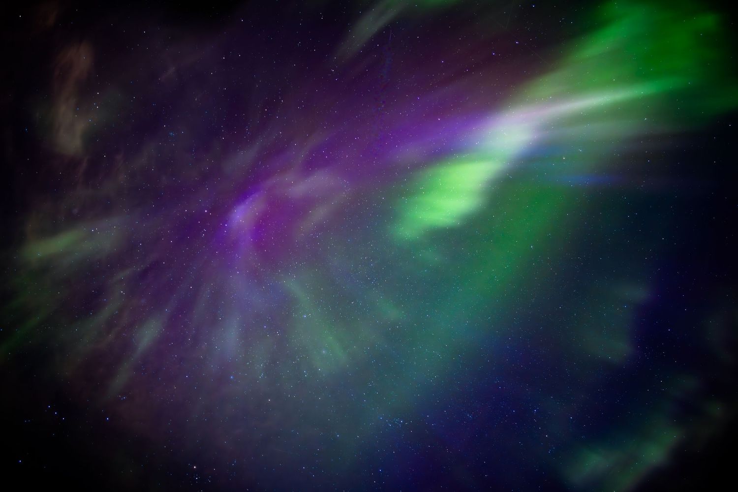 The corona of Aurora Borealis above the Albertan prairies