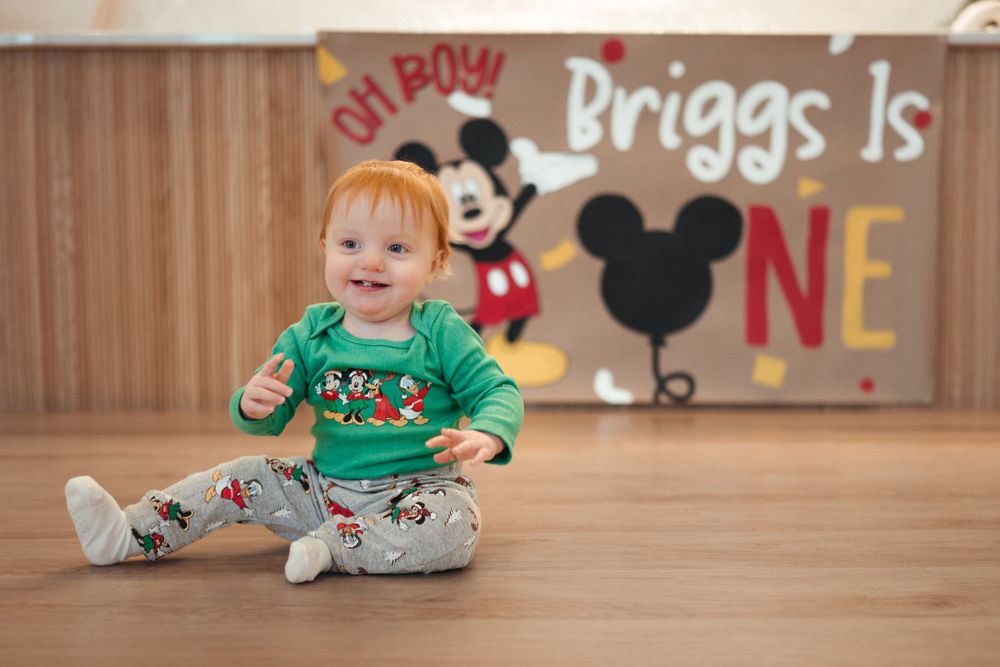Brookings milestone photographer capturing a little boy’s first birthday session.