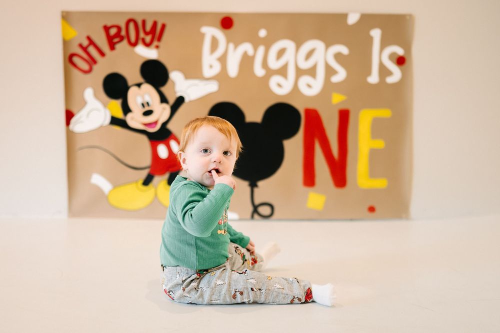 Brookings, SD first birthday session with a little boy and Mickey Mouse theme.