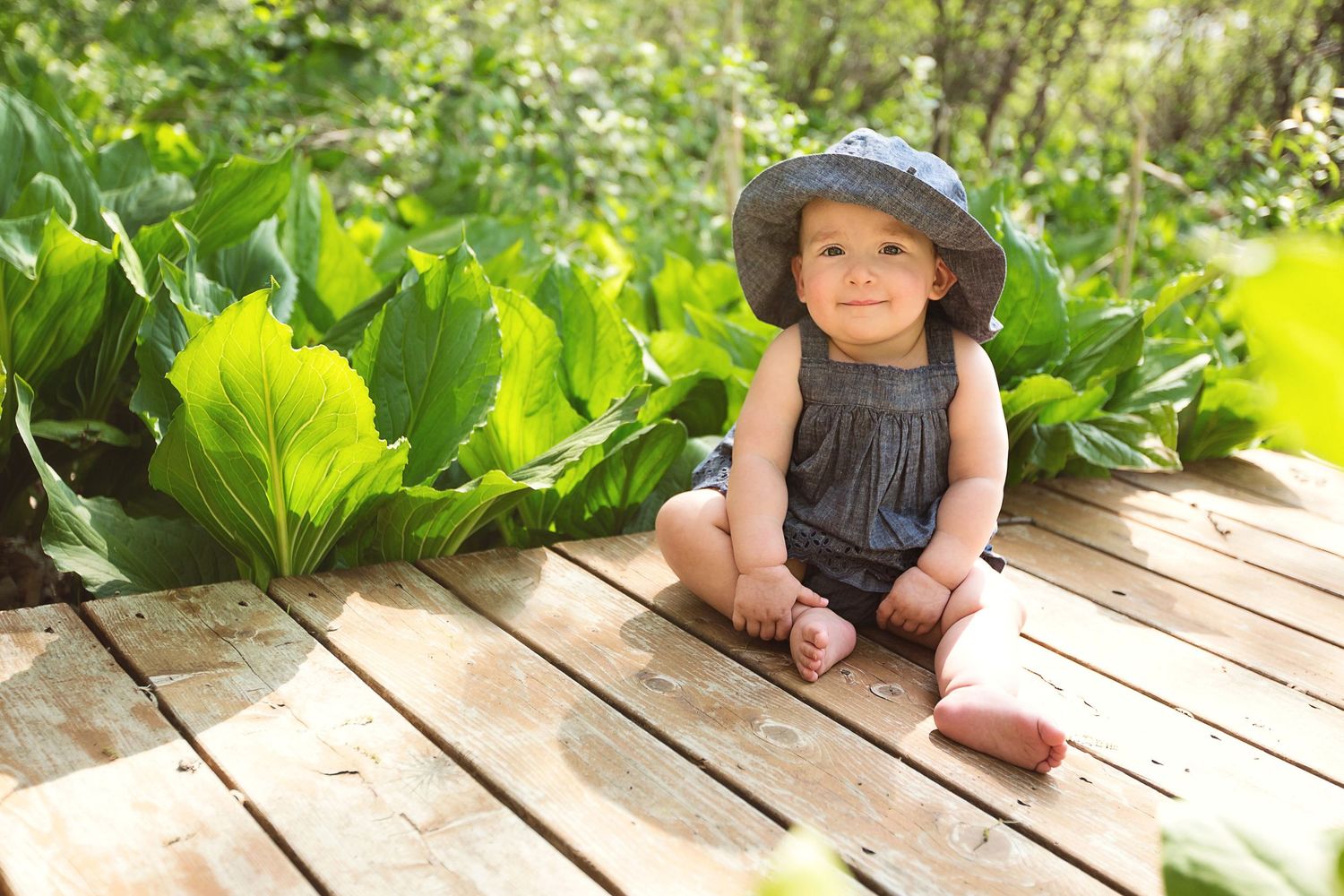 Kensington Metropark family and child photography; little girl 1 year portraits on nature trail boardwalk by Brighton, MI photographer