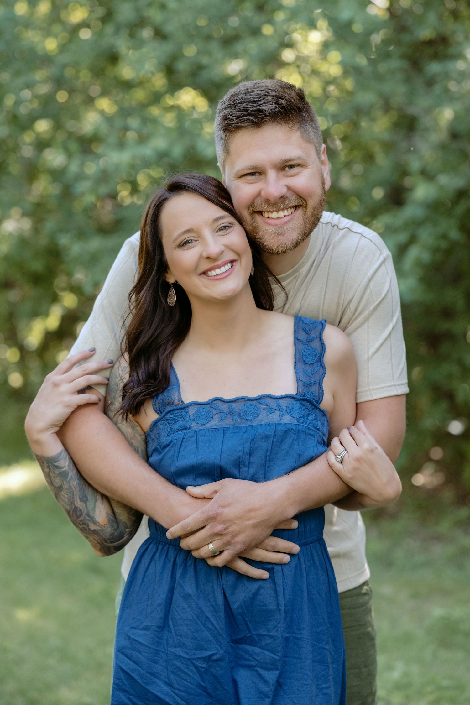 gorgeous portrait of mom and dad during and extended family session at powers lake park in woodbury mn