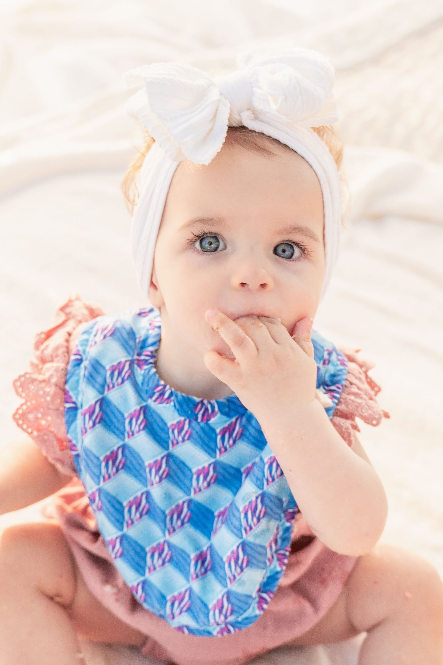 toddler girl cake smash one 1 year milestone outdoor photography, pink cake, conroe photographer