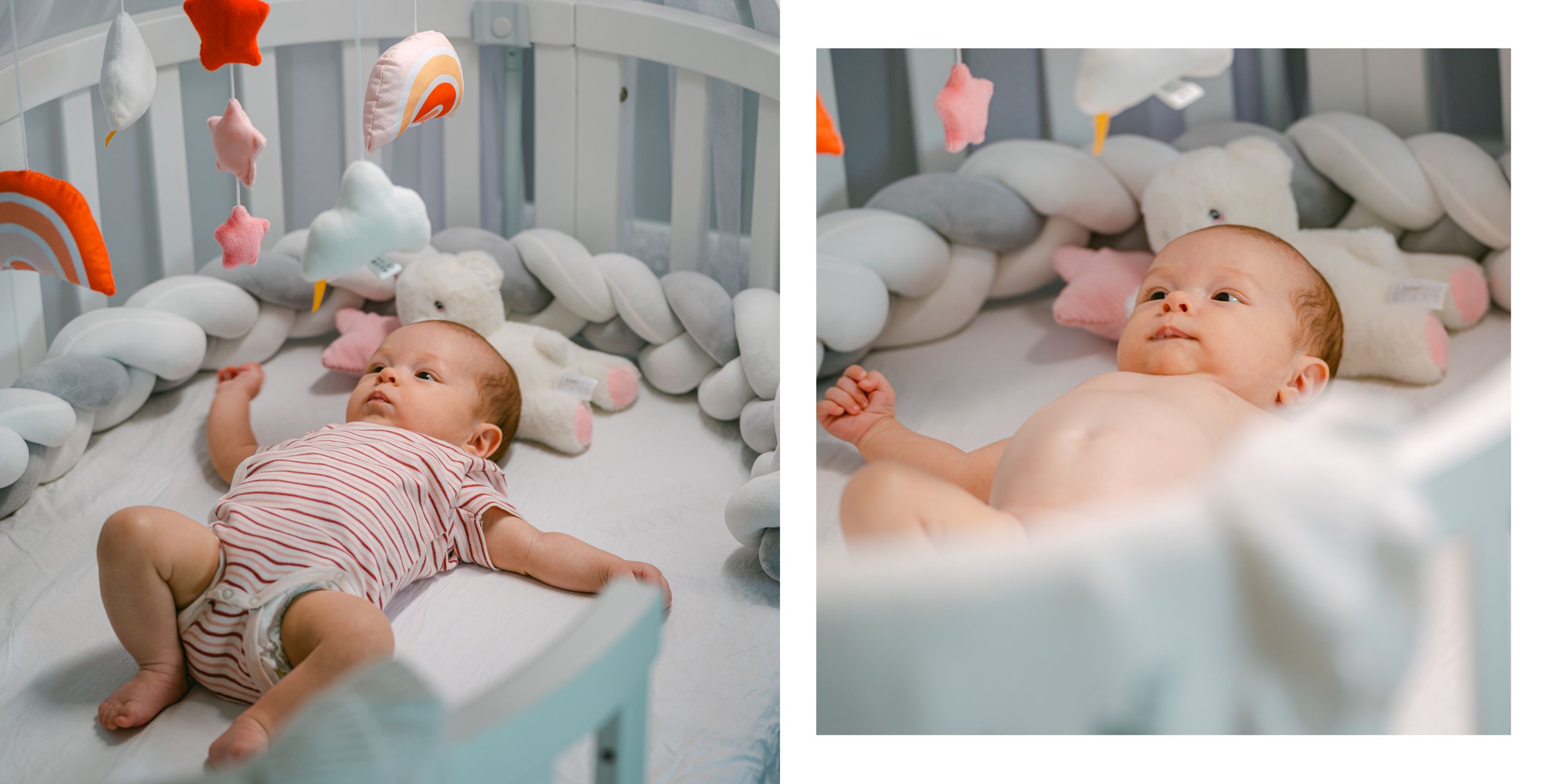 A sleeping infant rests peacefully in white and gray bedding, wearing a light-colored striped onesie.