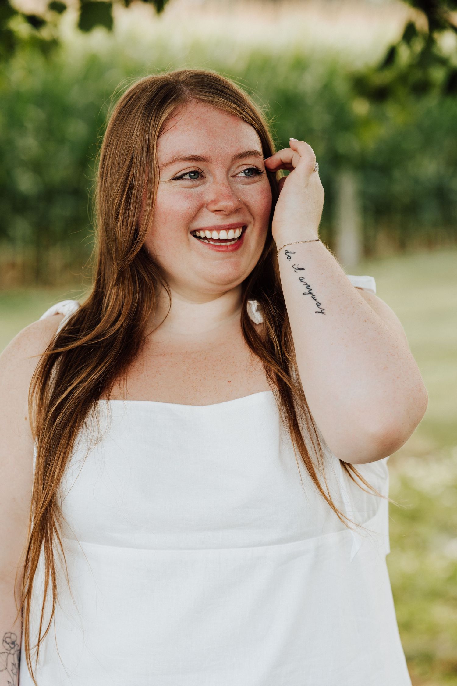Women's candid portrait for Engagement Photoshoot at Waltz Vineyards Estate Winery in Manheim, PA