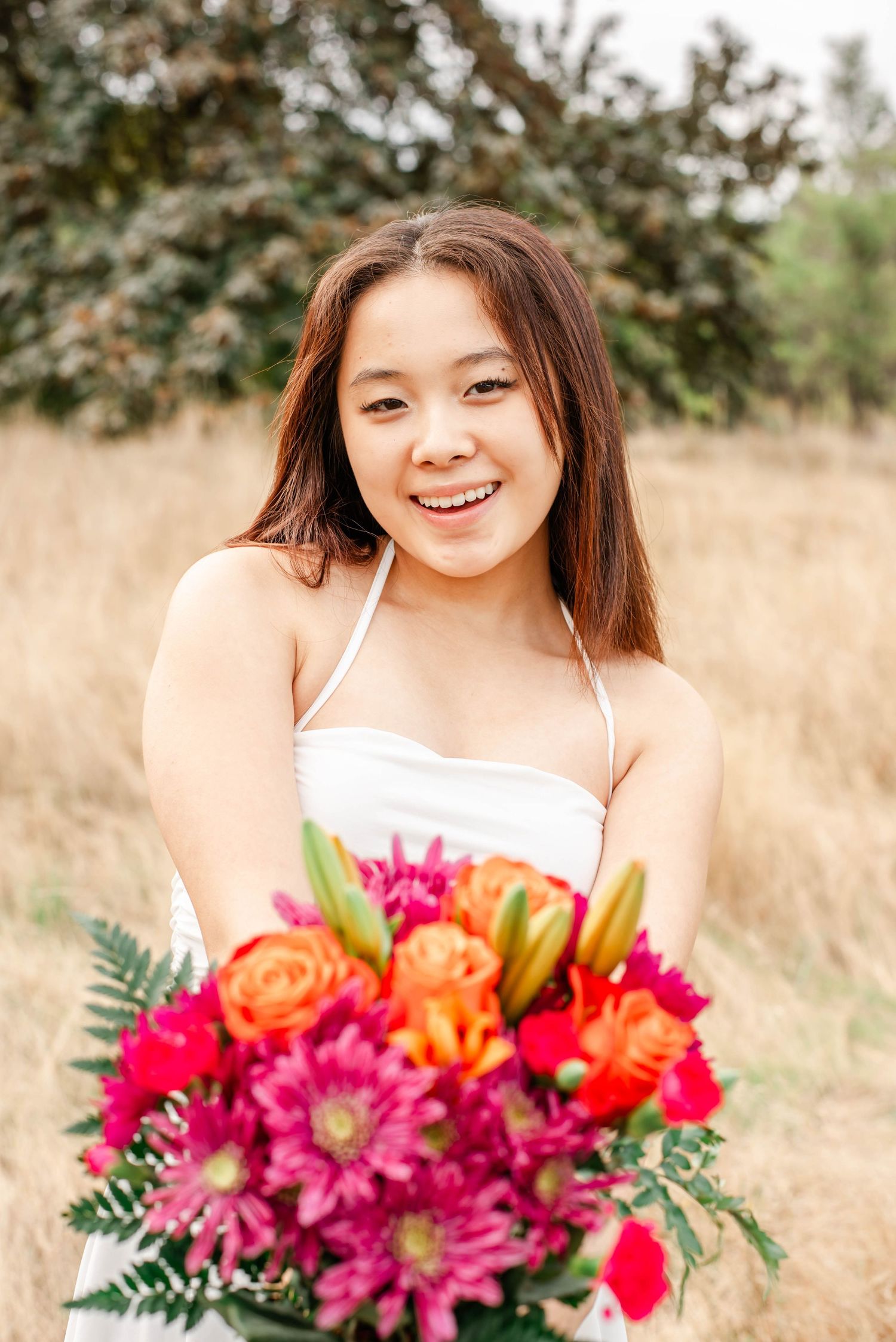A series of casual outdoor portrait shots in a field of tall golden grass.