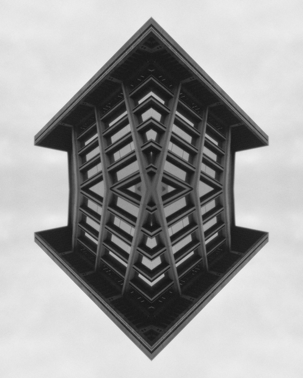 Architectural abstract black and white photo series showing a geometric diamond pattern rotated at different angles.