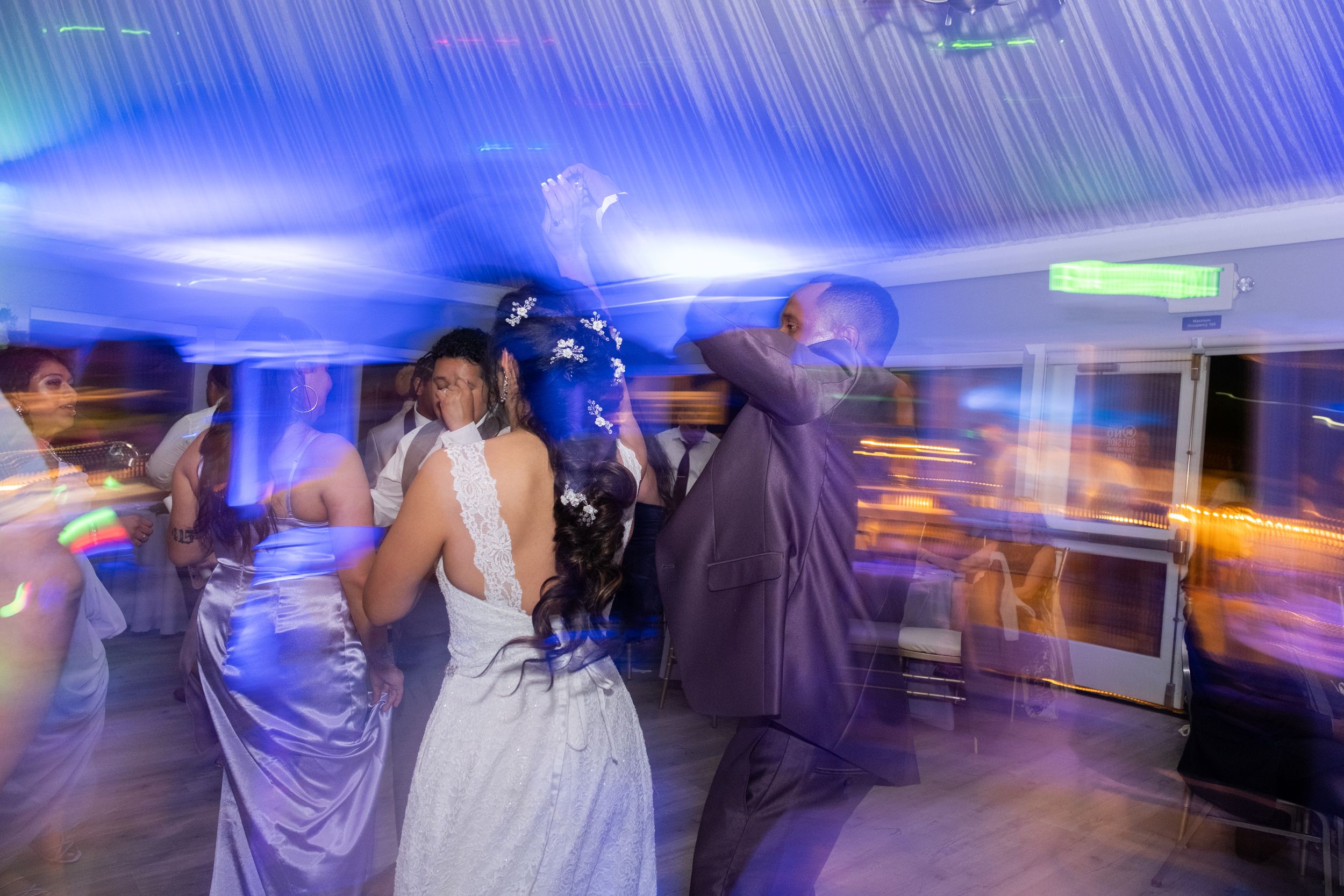 Couple dancing at their wedding party.