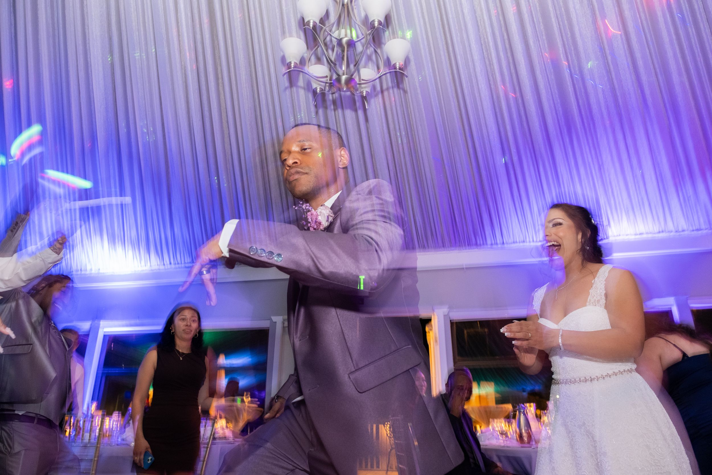 Couple dancing at their wedding party.