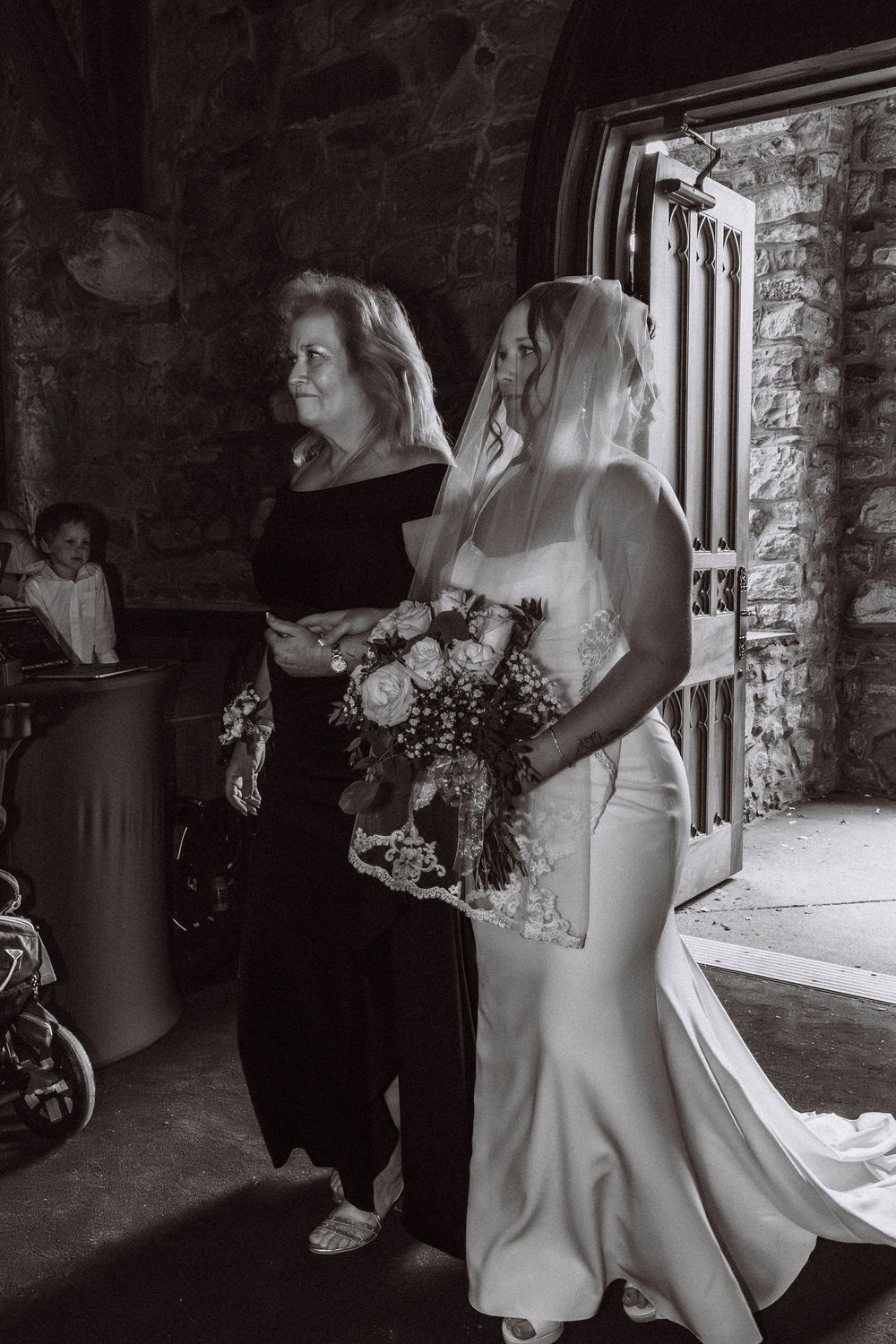 Bride walking down aisle at Cragsmoor stone church wedding ceremony in Hudson Valley NY
