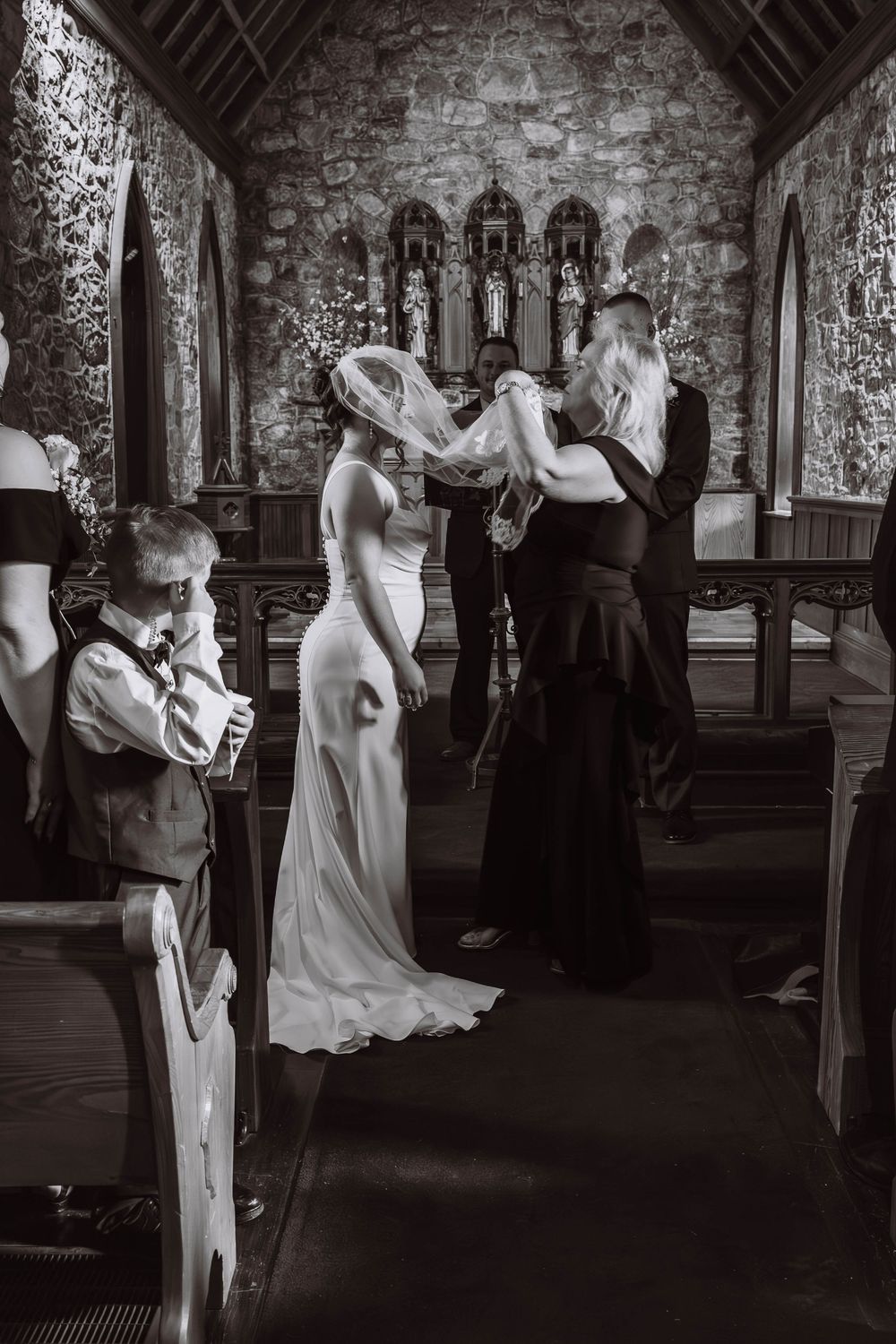 Bride walking down aisle at Cragsmoor stone church wedding ceremony in Hudson Valley NY