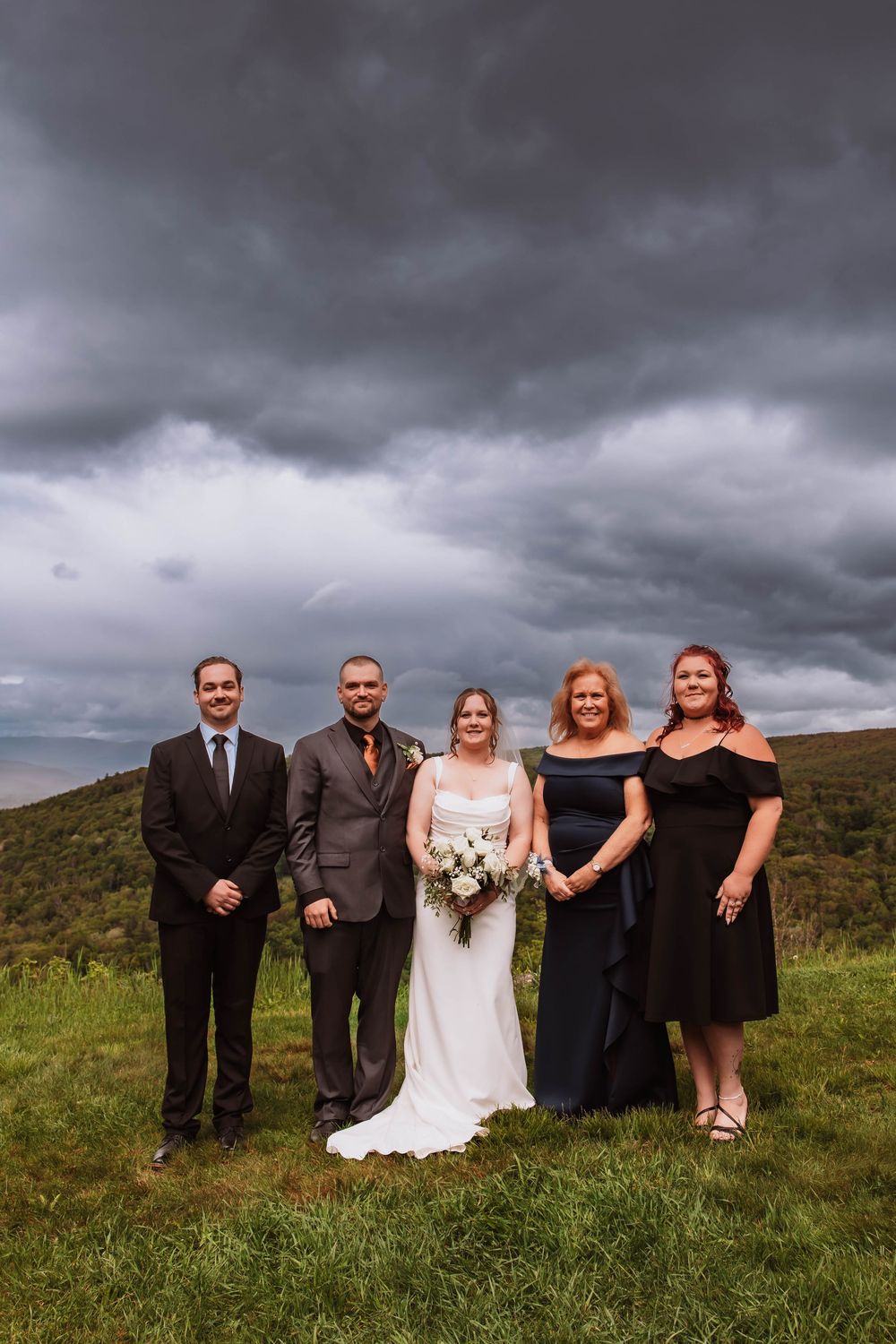 Groom and bride family portraits with mountain views in the hudson valley NY
