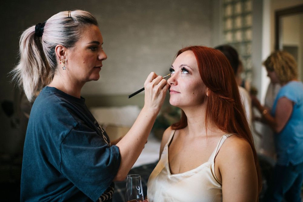 Getting ready moments captured in natural light before the ceremony.