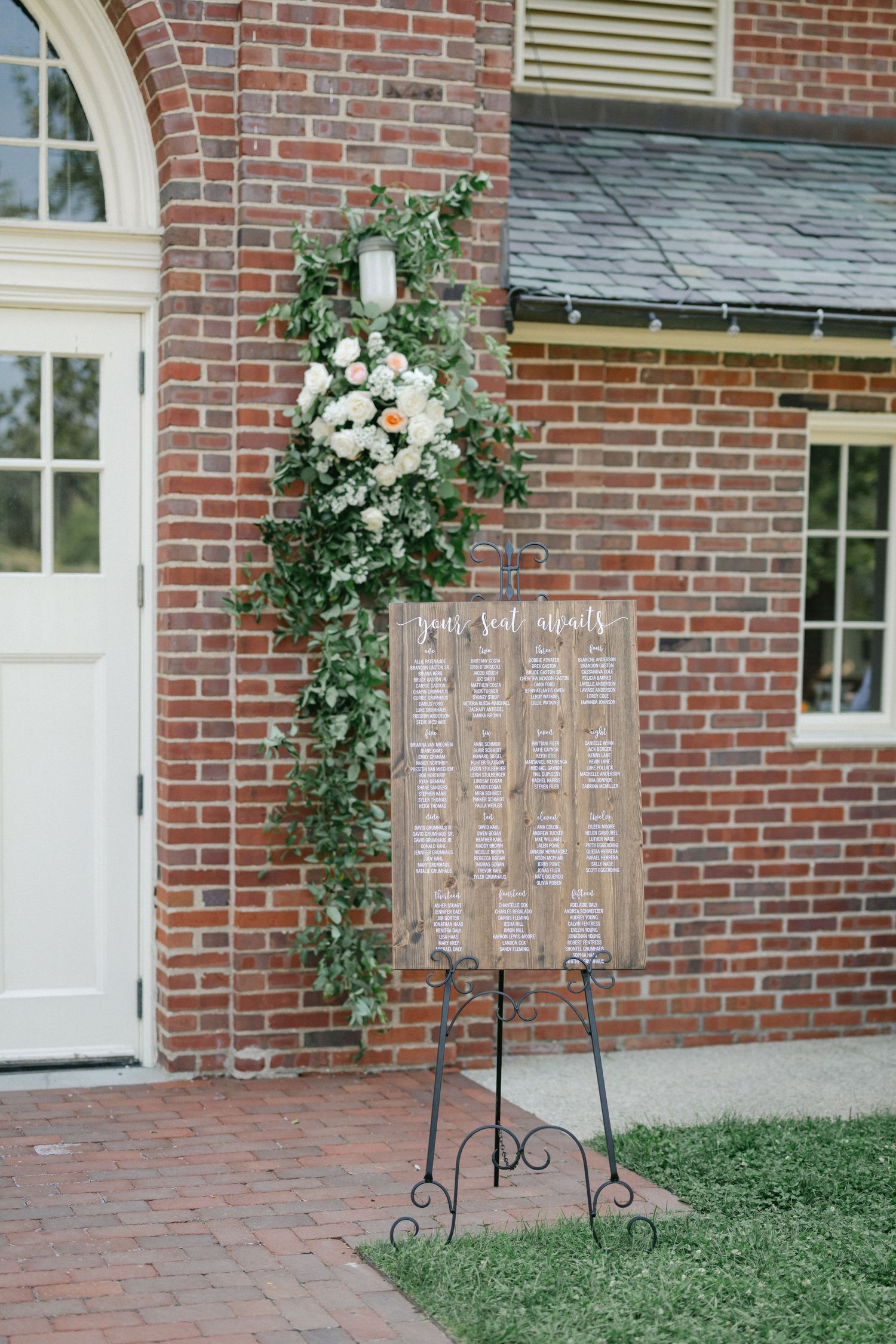 Elegant wedding table decor with frosted glass candle holders and floral arrangements in peach and white tones. - Elawa Farm