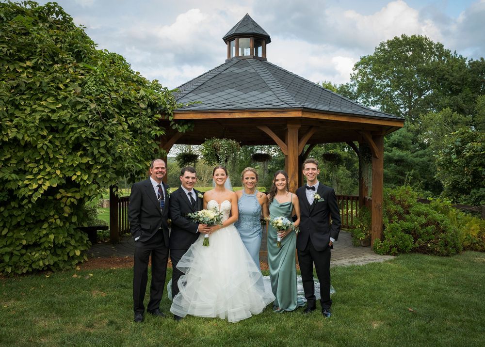 A series of wedding photos showing outdoor ceremony moments under a wooden gazebo surrounded by lush greenery.