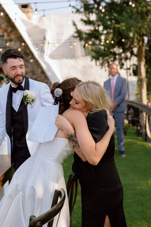 A sequence of joyful candid moments between a bride and bridesmaid during an outdoor wedding celebration.
