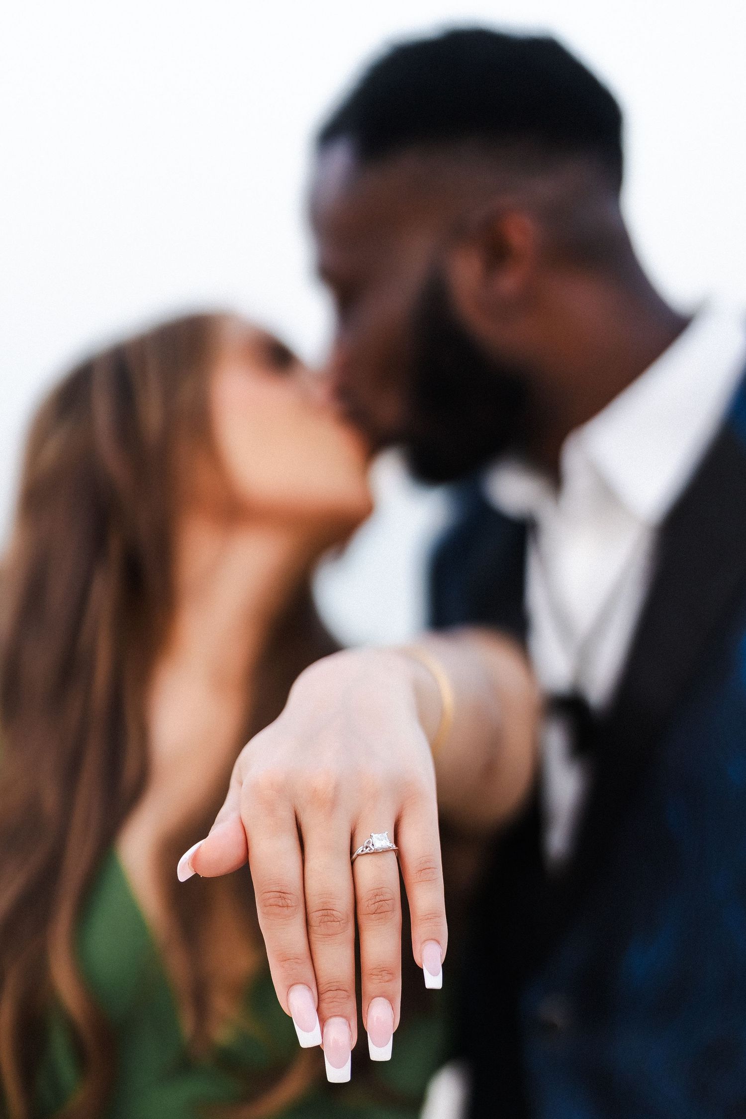 Surprise proposal photography in Dubai highlighting engagement ring moment