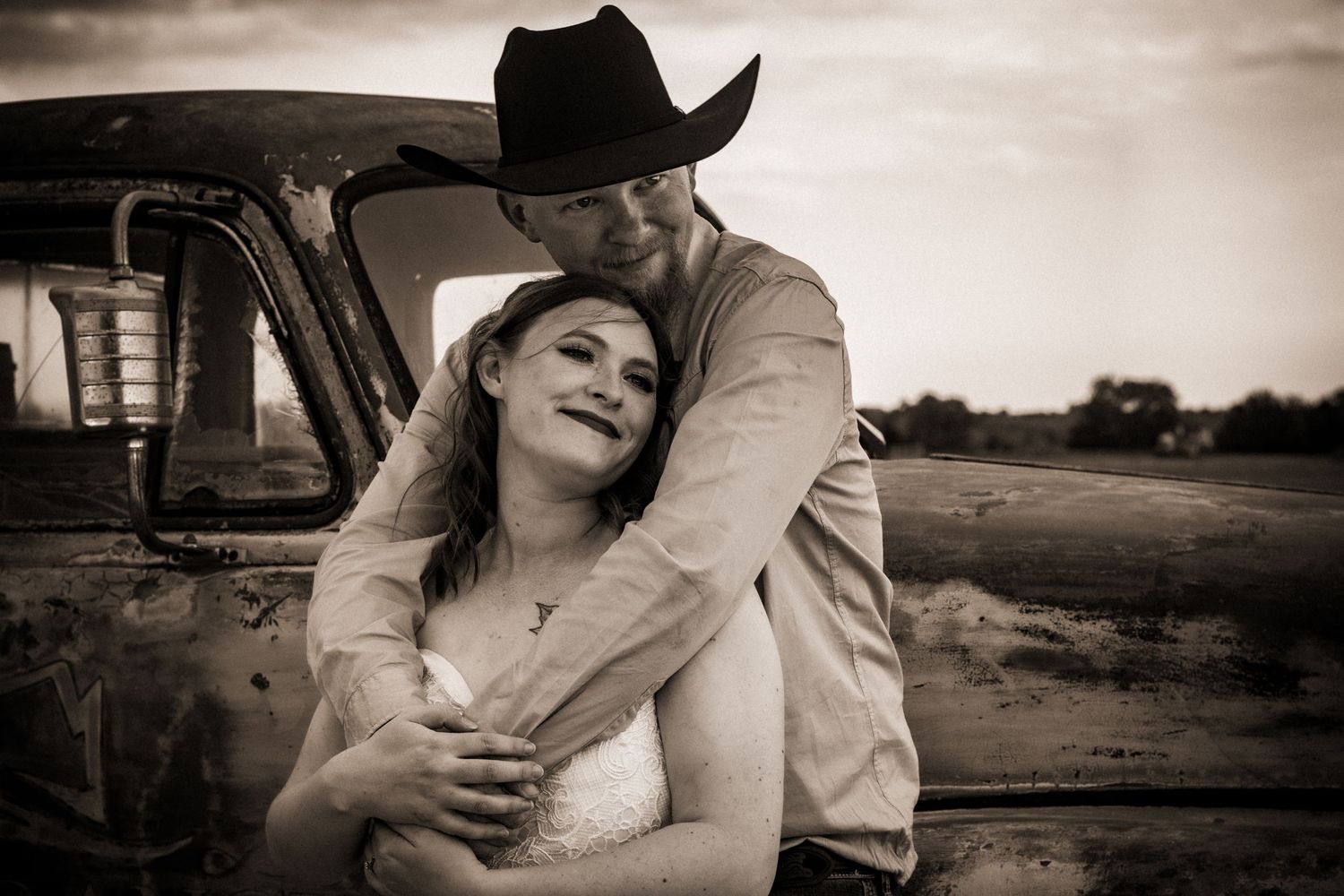 A man and a woman holding hands, symbolizing love and connection in a warm, intimate moment.