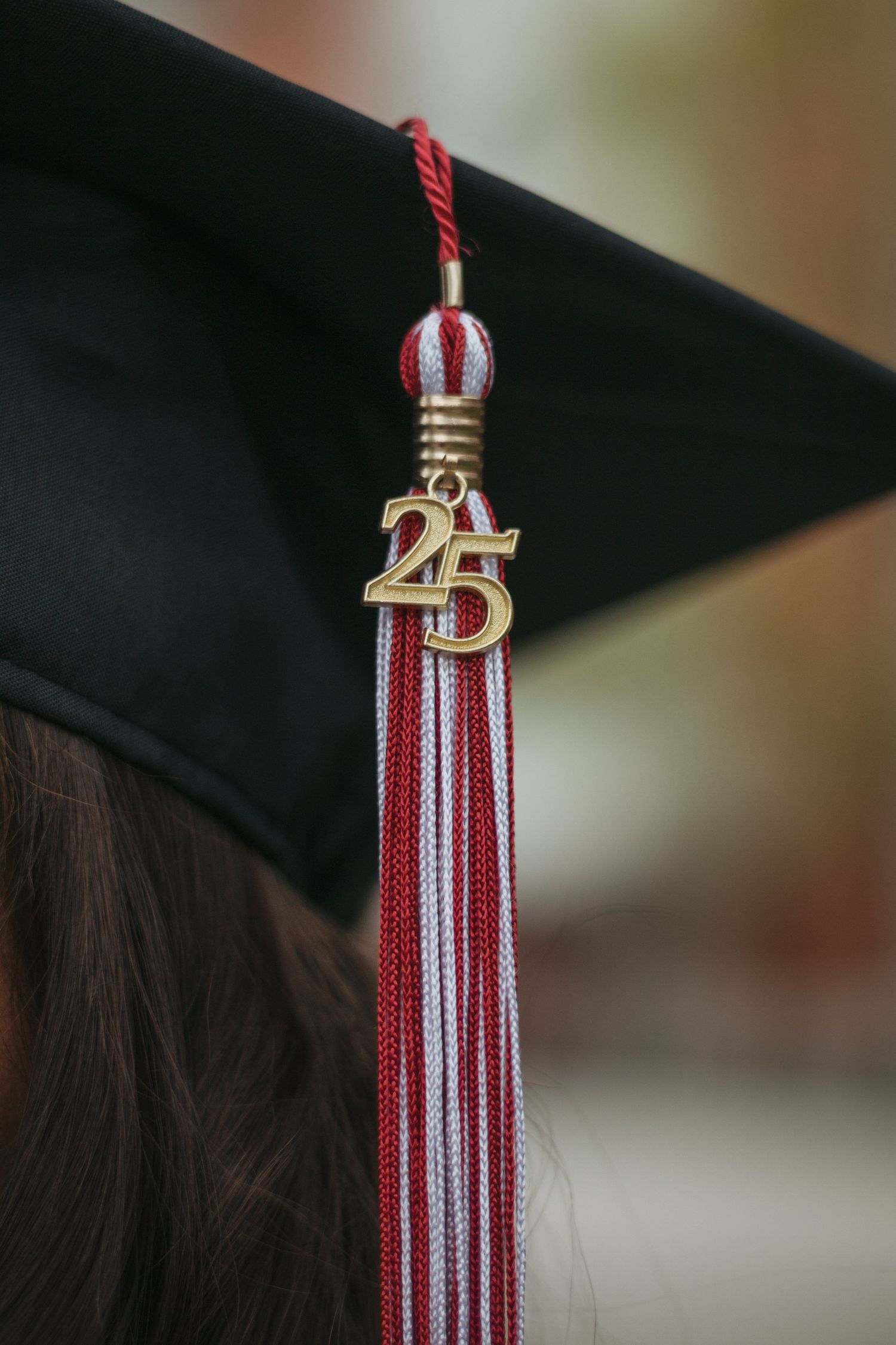 Senior session at Lock Haven University. Cap, gown, tassel