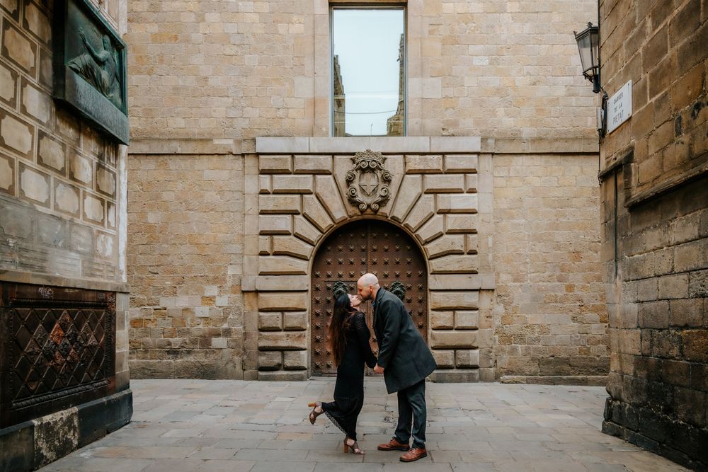 Sunlight framing the couple near a quiet corner of the Gothic Cathedral