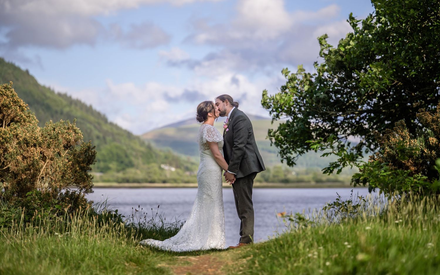 Bride and groom at Bassenthwaite Lake during their wedding at Armathwaite Hall