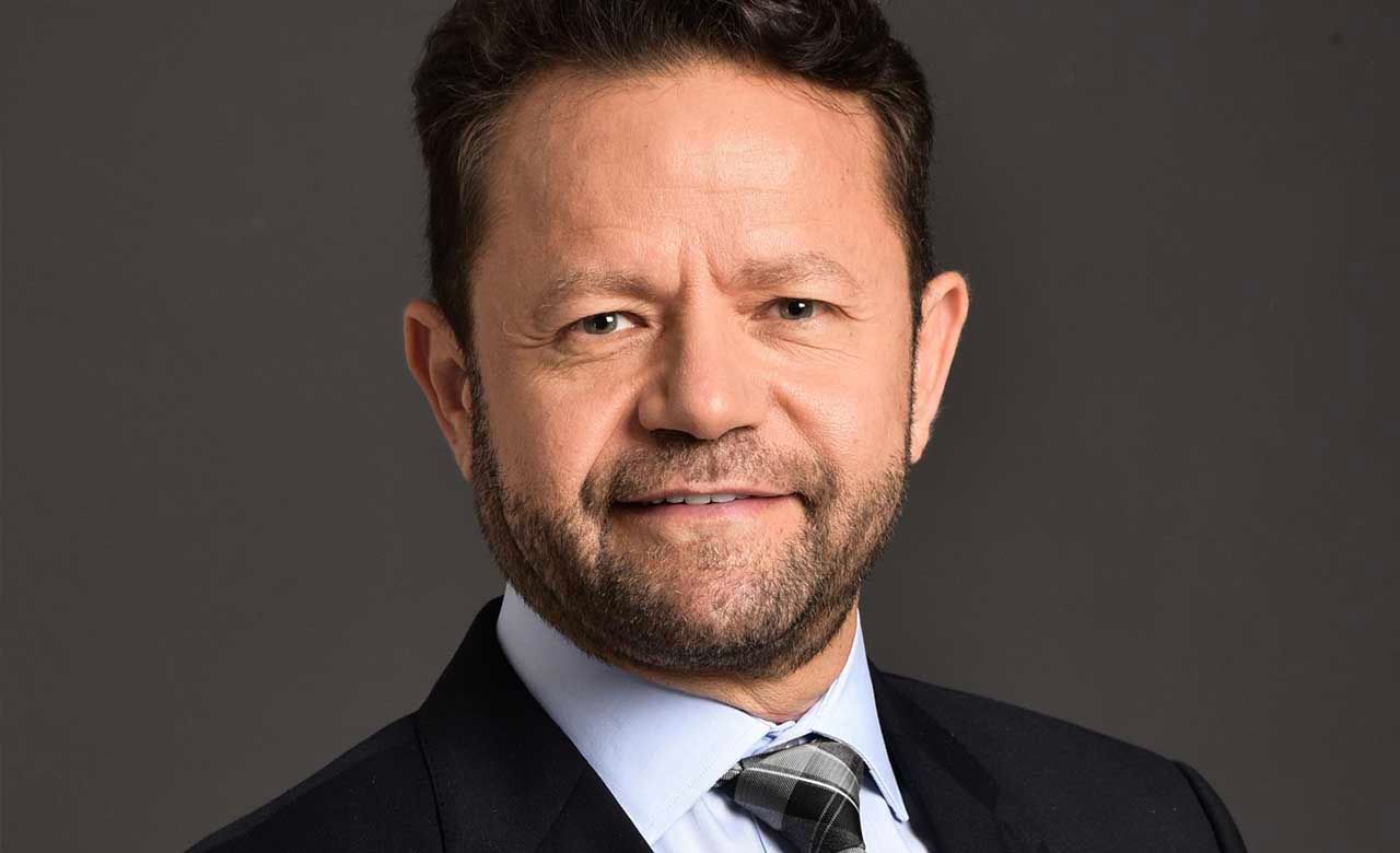 Professional headshots against dark background showing confident expressions.