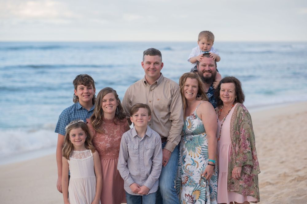 A family together during a family photo session on Oahu North Shore.