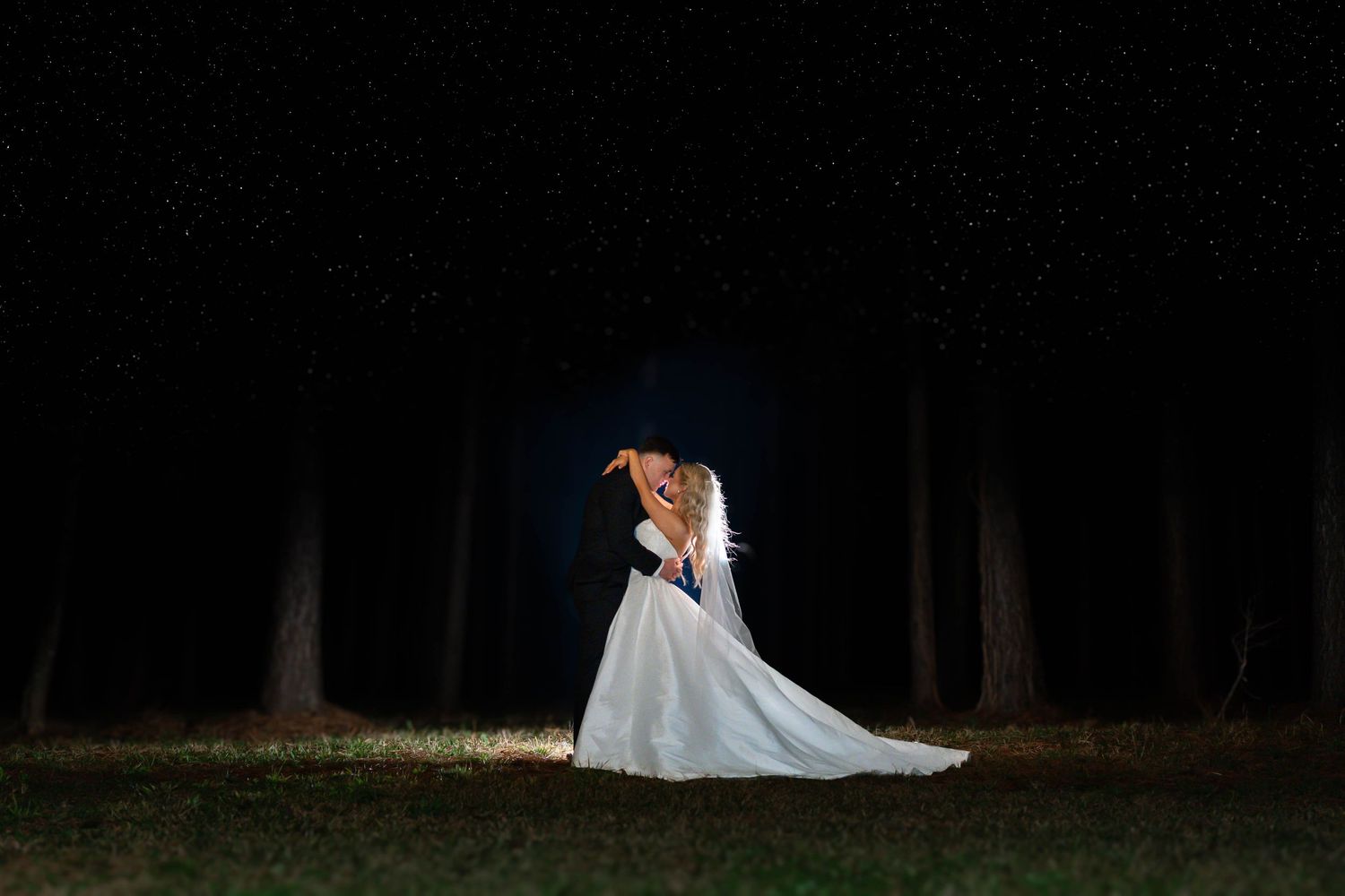 bride and groom under the stars