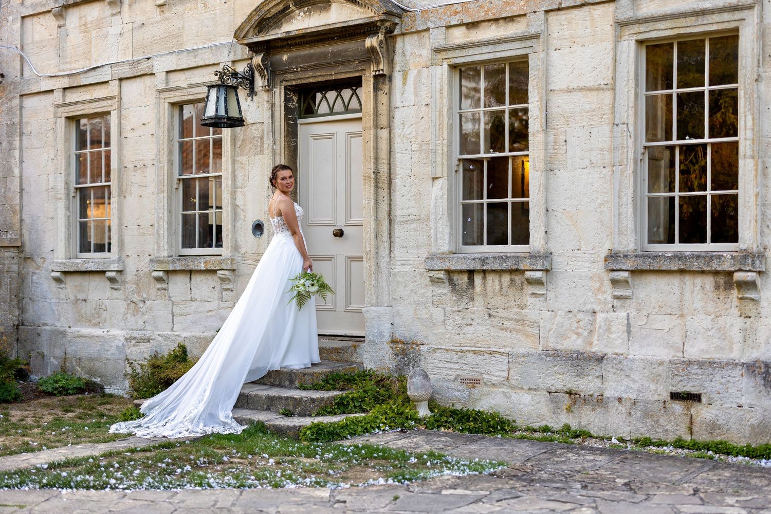 Bride in her flowing dress, Bradford on Avon, Wiltshire