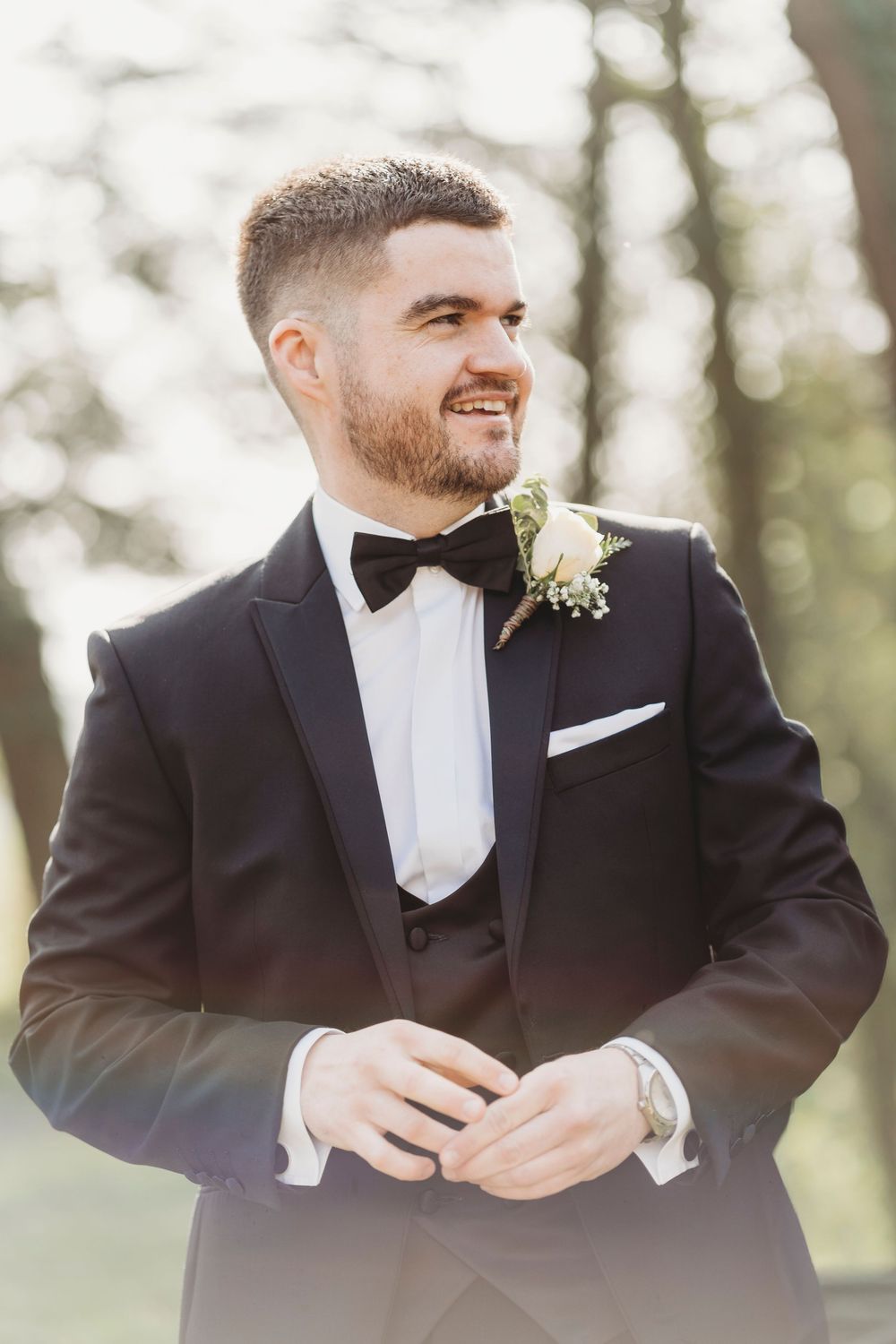 Groom portrait outdoors at Parc Le Breos wedding in Gower, West Wales