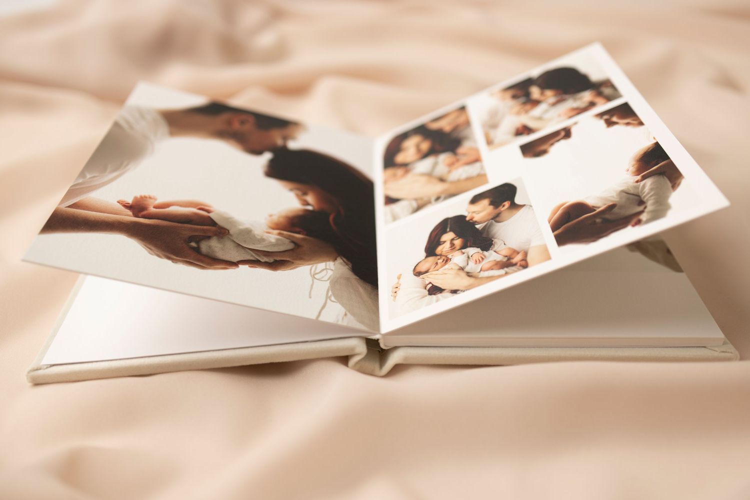 A collection of vintage photographs and photo albums arranged in a nostalgic display on a light colored surface.