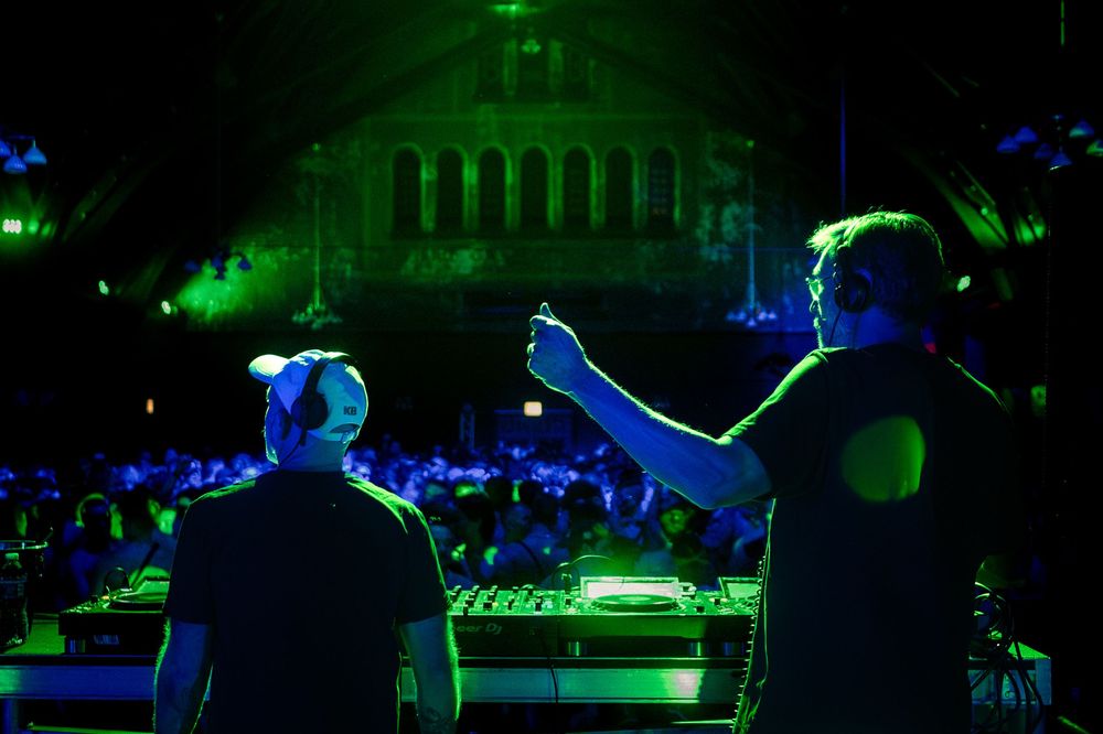 DJ duo Horse Meat Disco performs their set at Requiem in Chicago at Epiphany Center with the crowd in the background