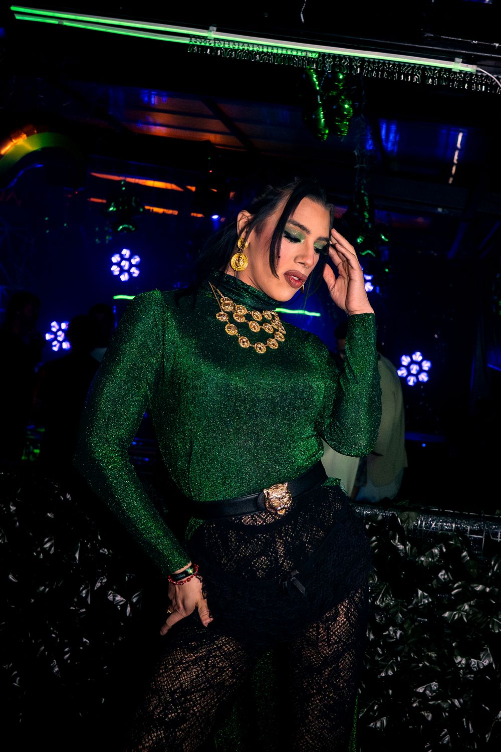 A partygoer poses for a picture at a nightlife event in Chicago