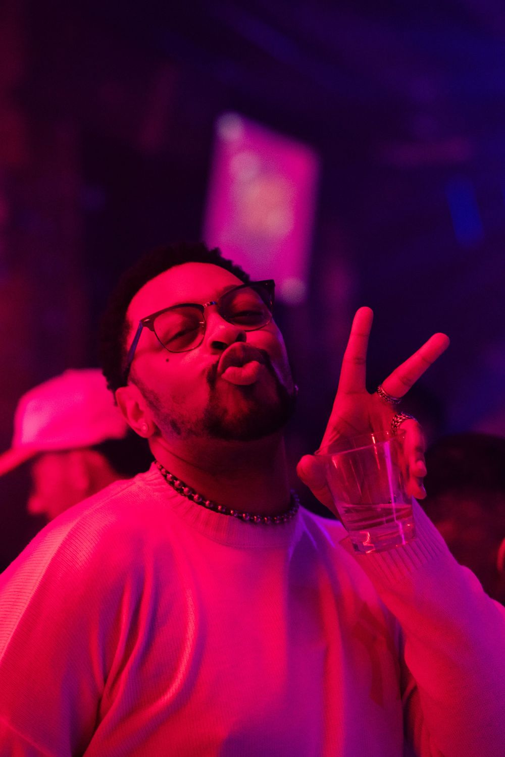 A partygoer poses for a picture at a nightlife event in Chicago