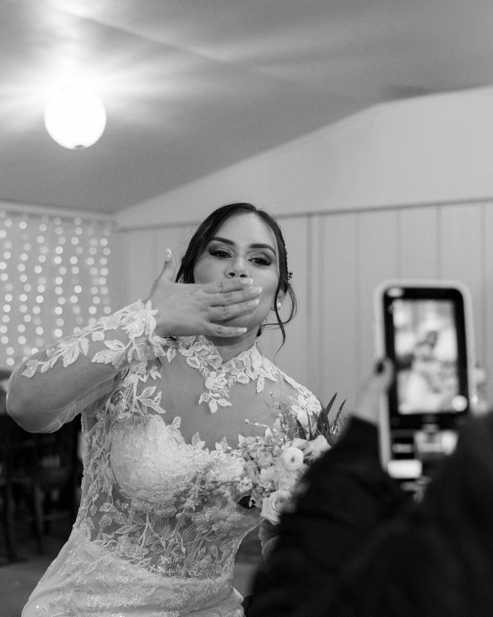 Bride smiling and celebrating during wedding preparation moment