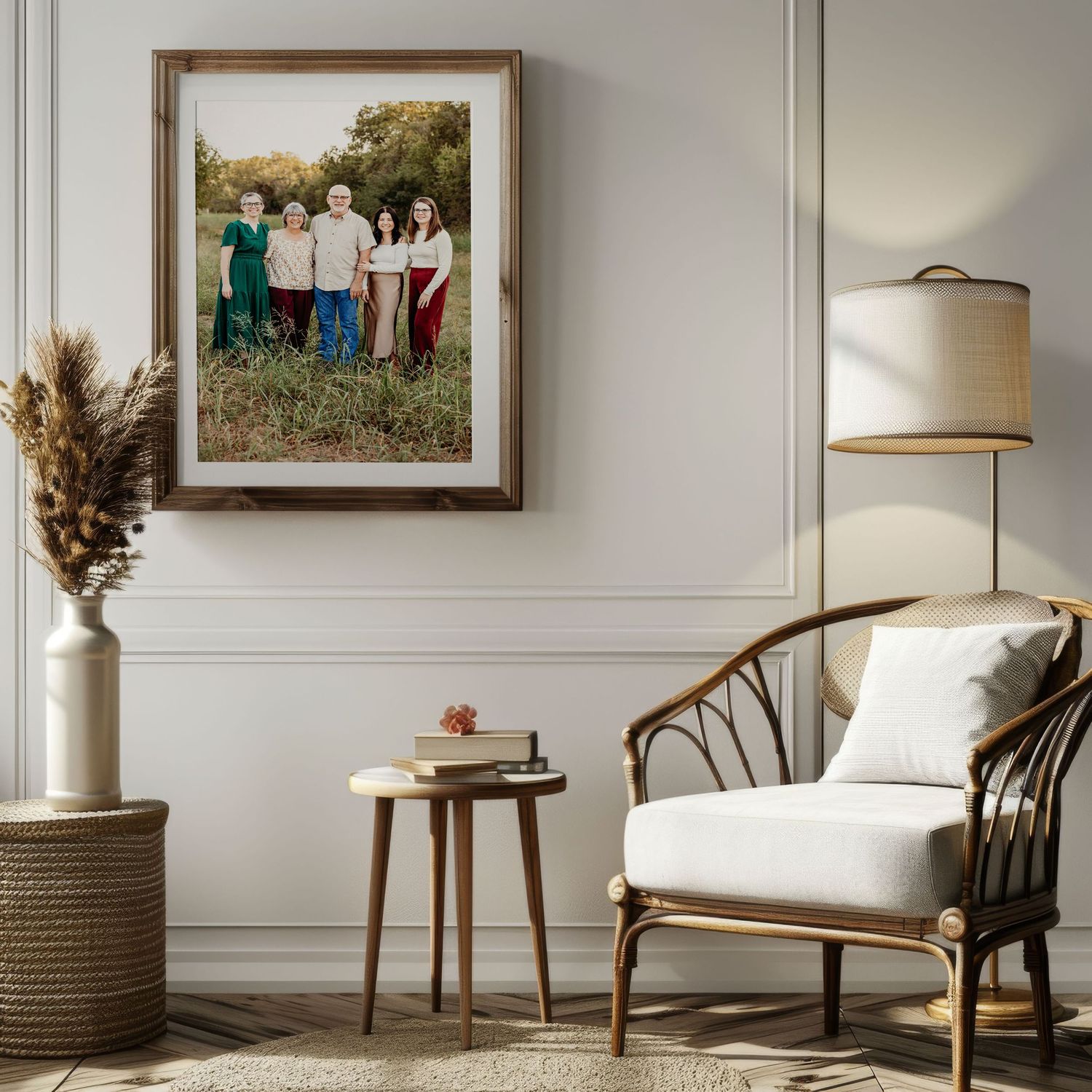 Cozy living room with rattan chair, floor lamp, and framed family portrait on white wall in Fort Worth, TX.