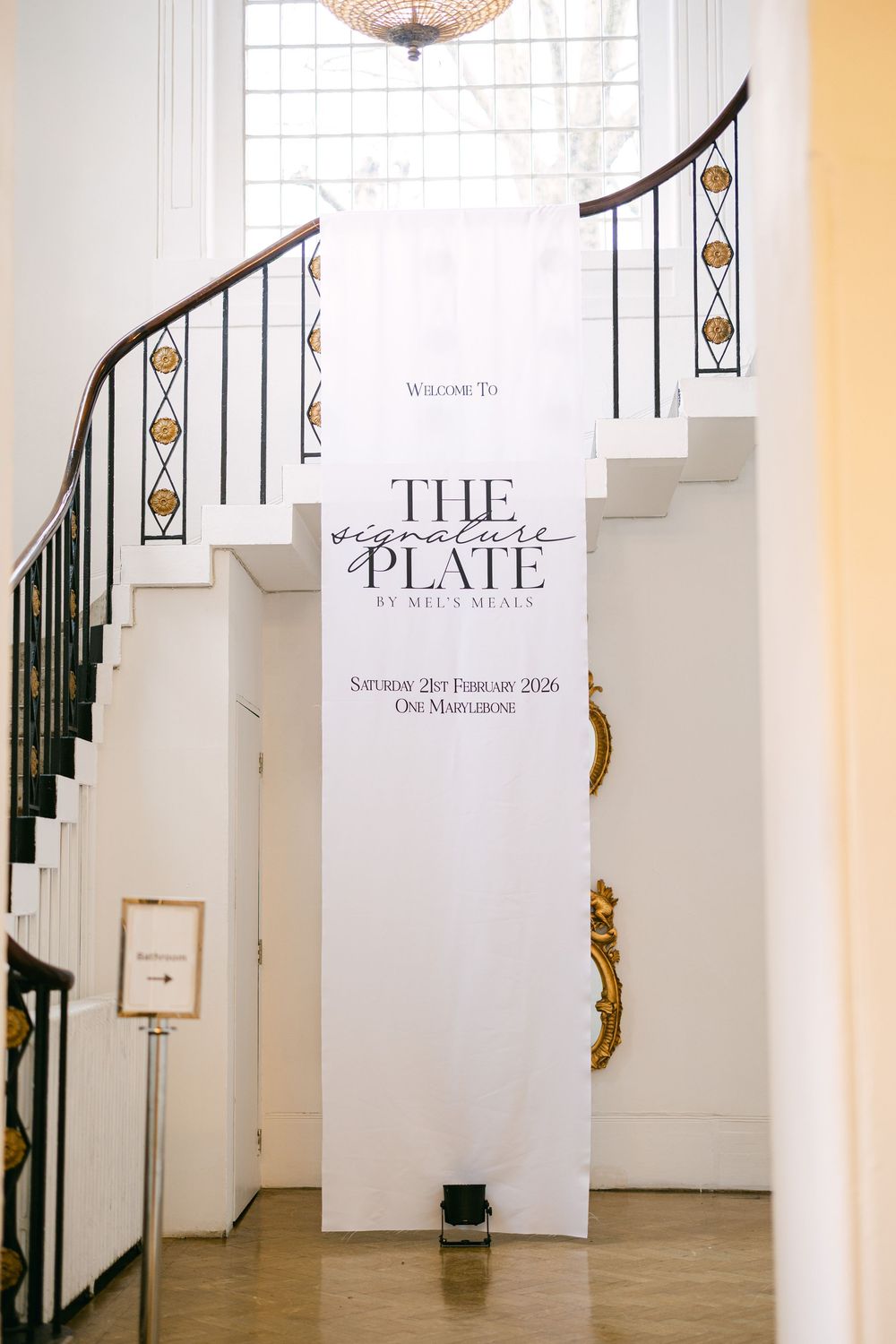 Elegant white banner for The Signature Plate by Mel's Meals event at One Marylebone, Saturday 21st February 2026.