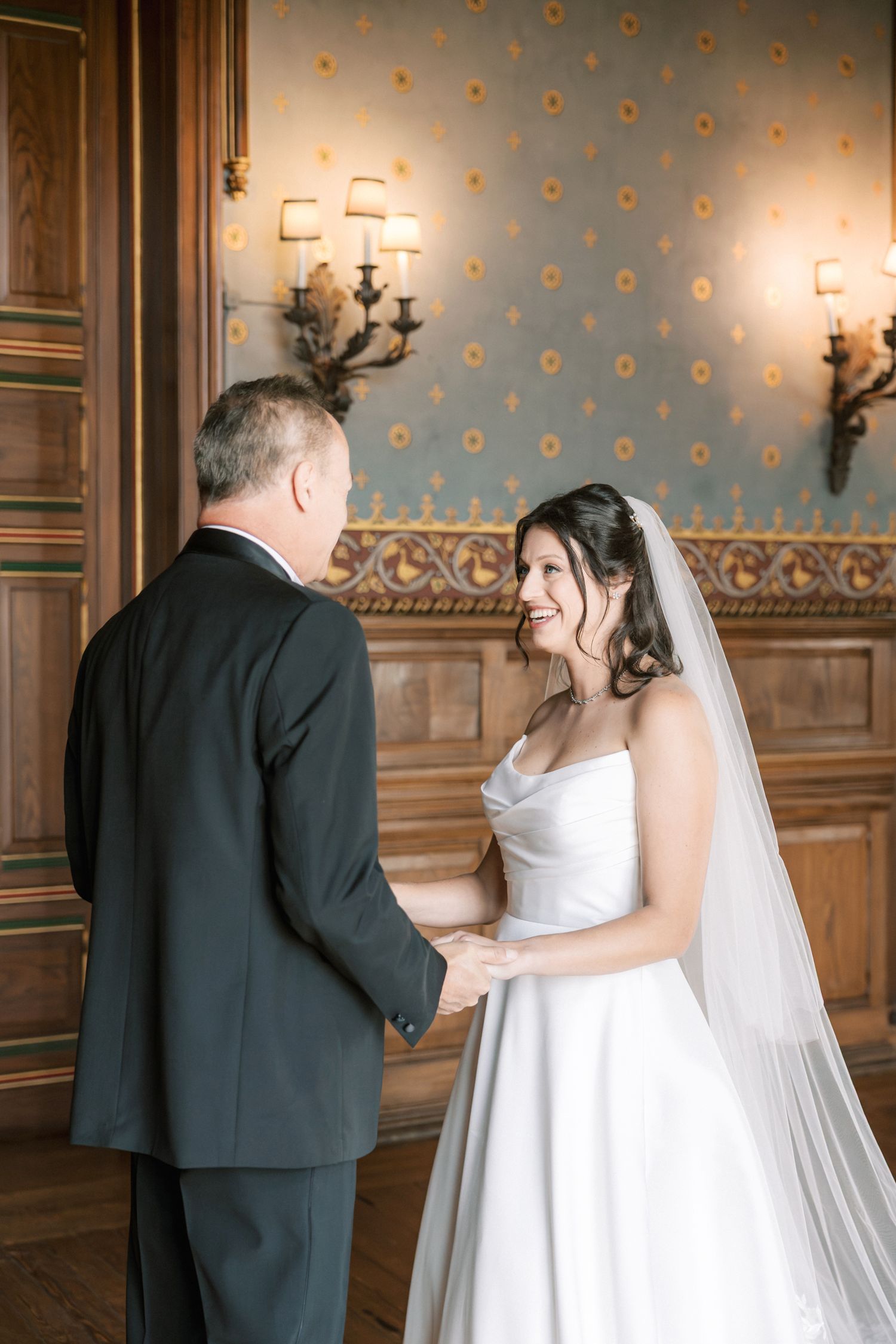 Emotional first look between bride and father at Forte da Cruz before wedding ceremony in Cascais Portugal